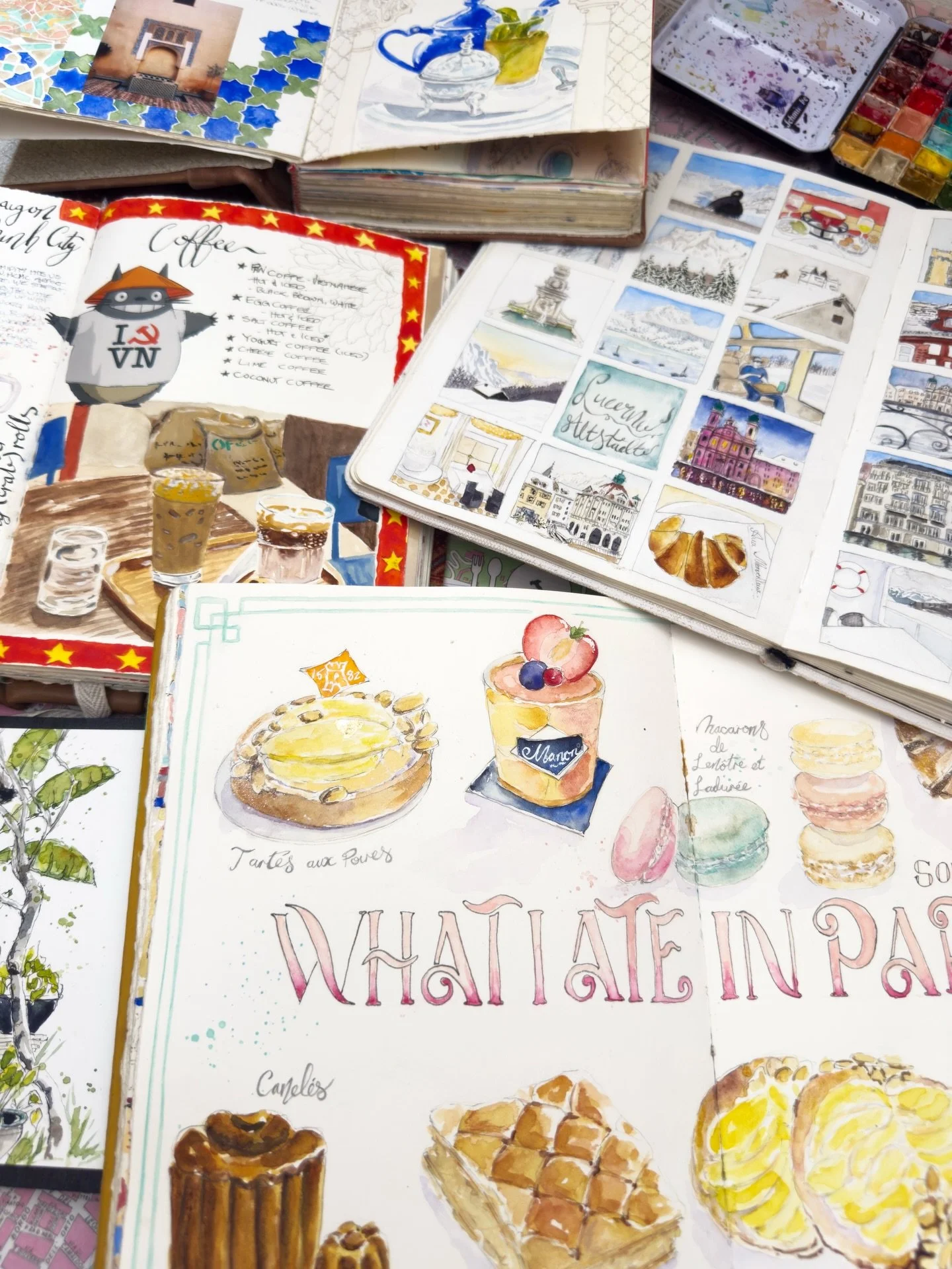 Travel sketchbooks laid open by Galia Alena
