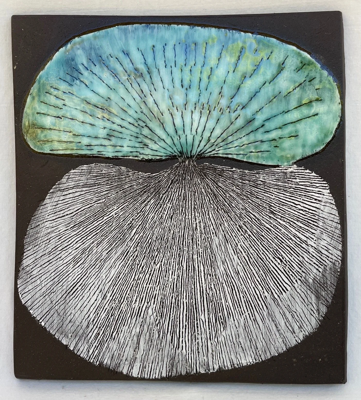 “Reflection”; Ceramic; 8.25”H x 7.25W x .25D; 2024