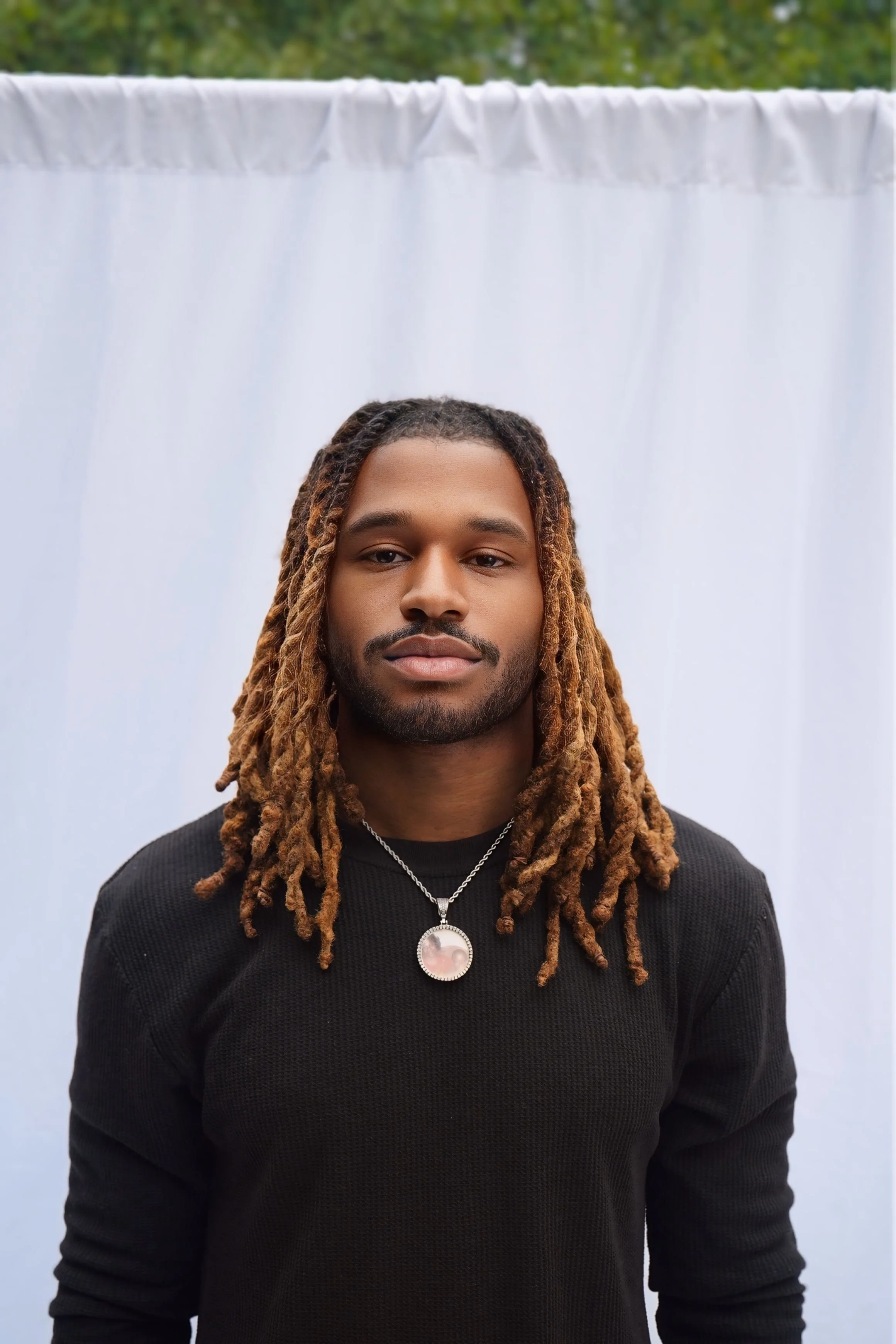 MIKE MIDSHOT FACING FOR PROMO.jpg