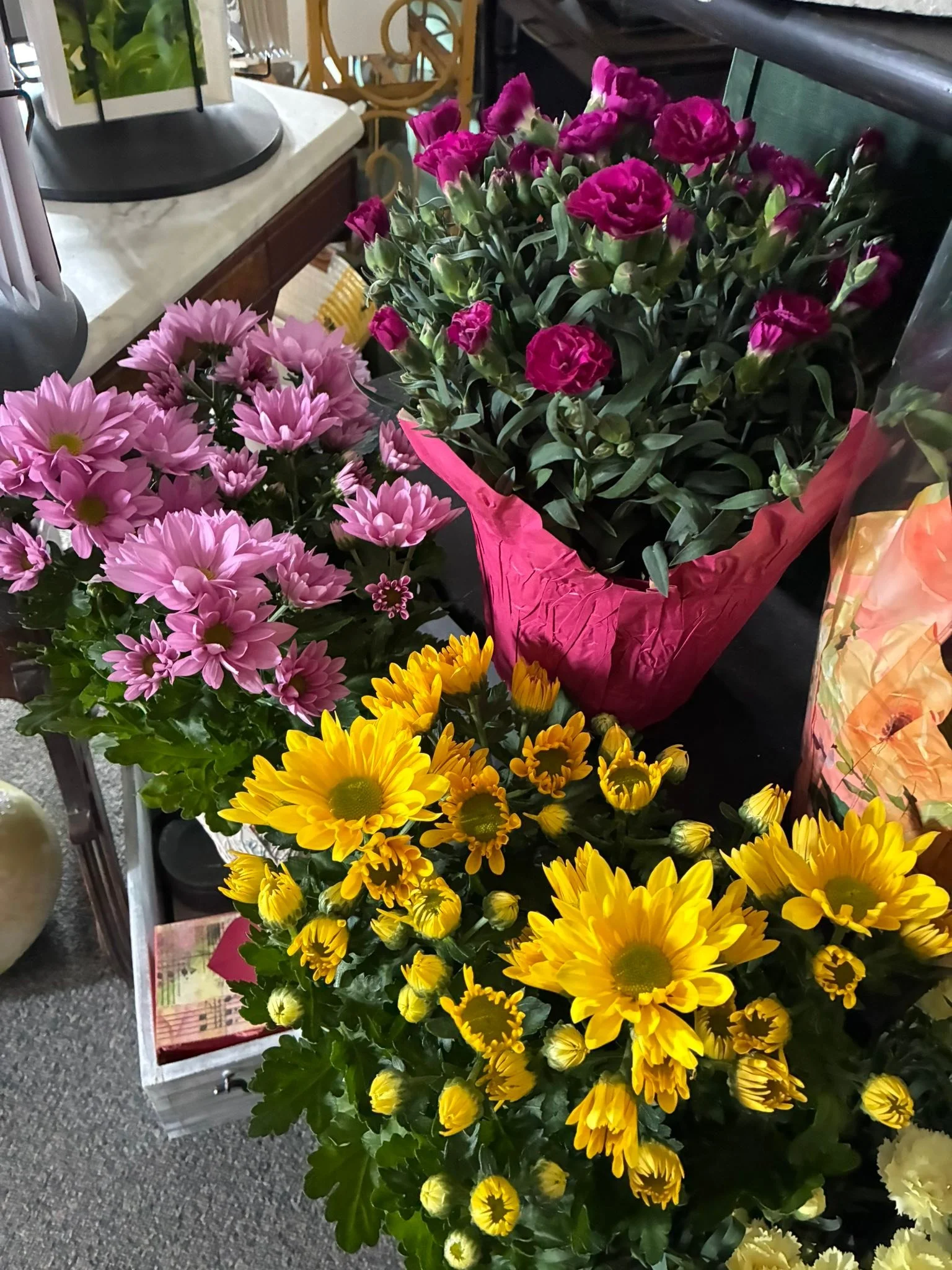 So many pretties!!! Stop in for a Mother&rsquo;s Day gift or bring her along to pick out  her own! Gift certificates available as well🩷🌸 #shoplocal #greenhouse2026 #mothersdaygift
