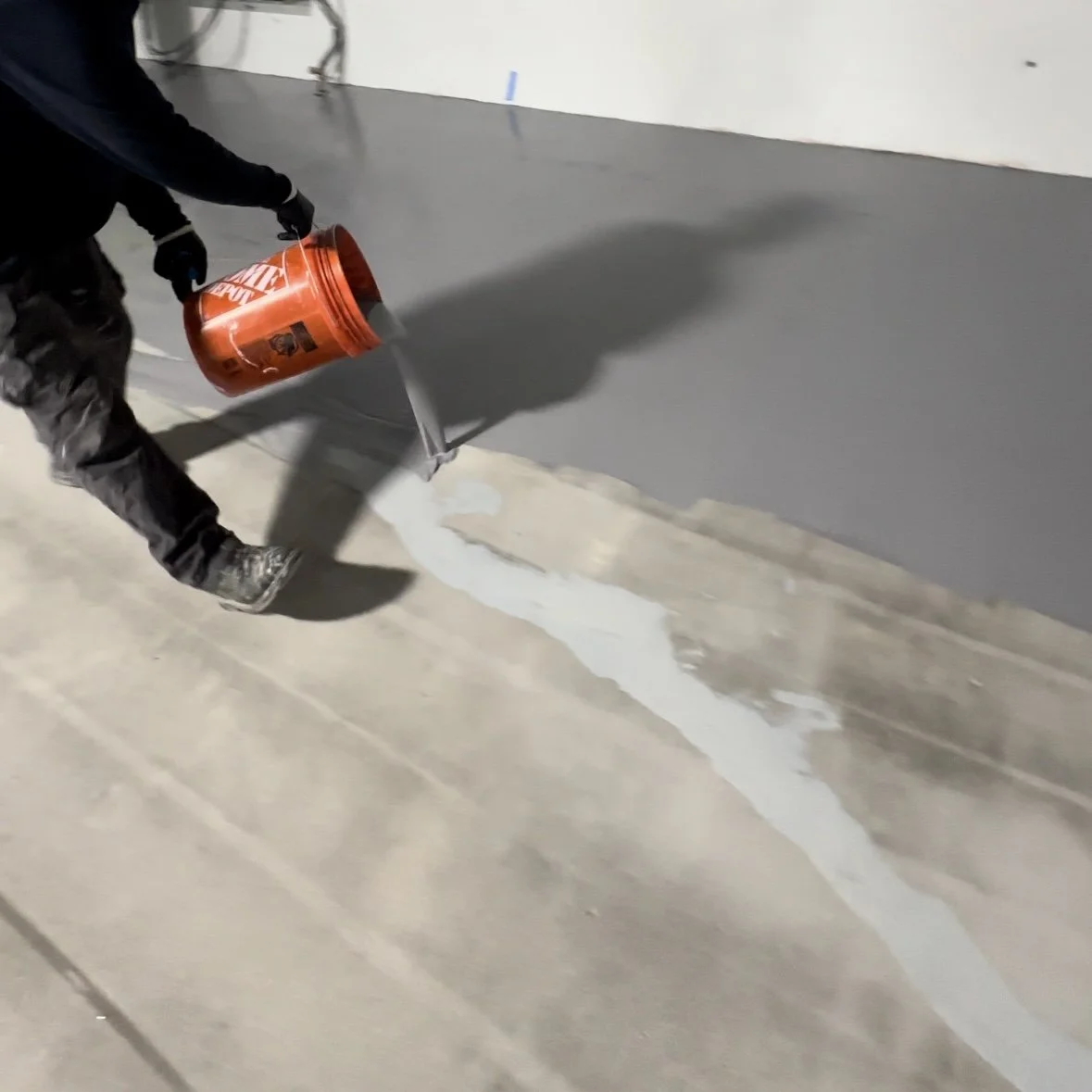 Pouring Cement Urethane on Concrete Floor. Babylon, NY