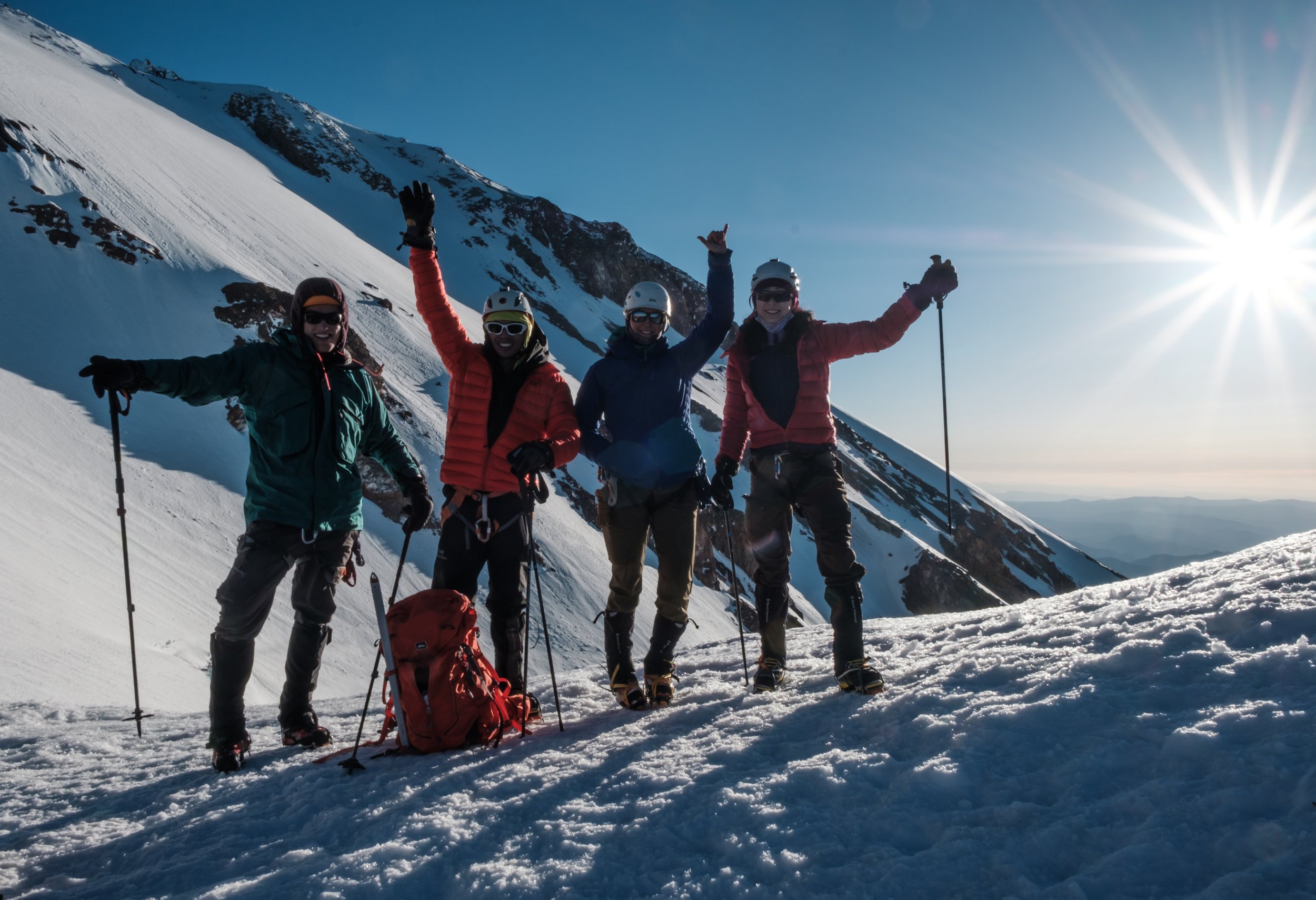 Climbers pose at a ridge on mt shasta