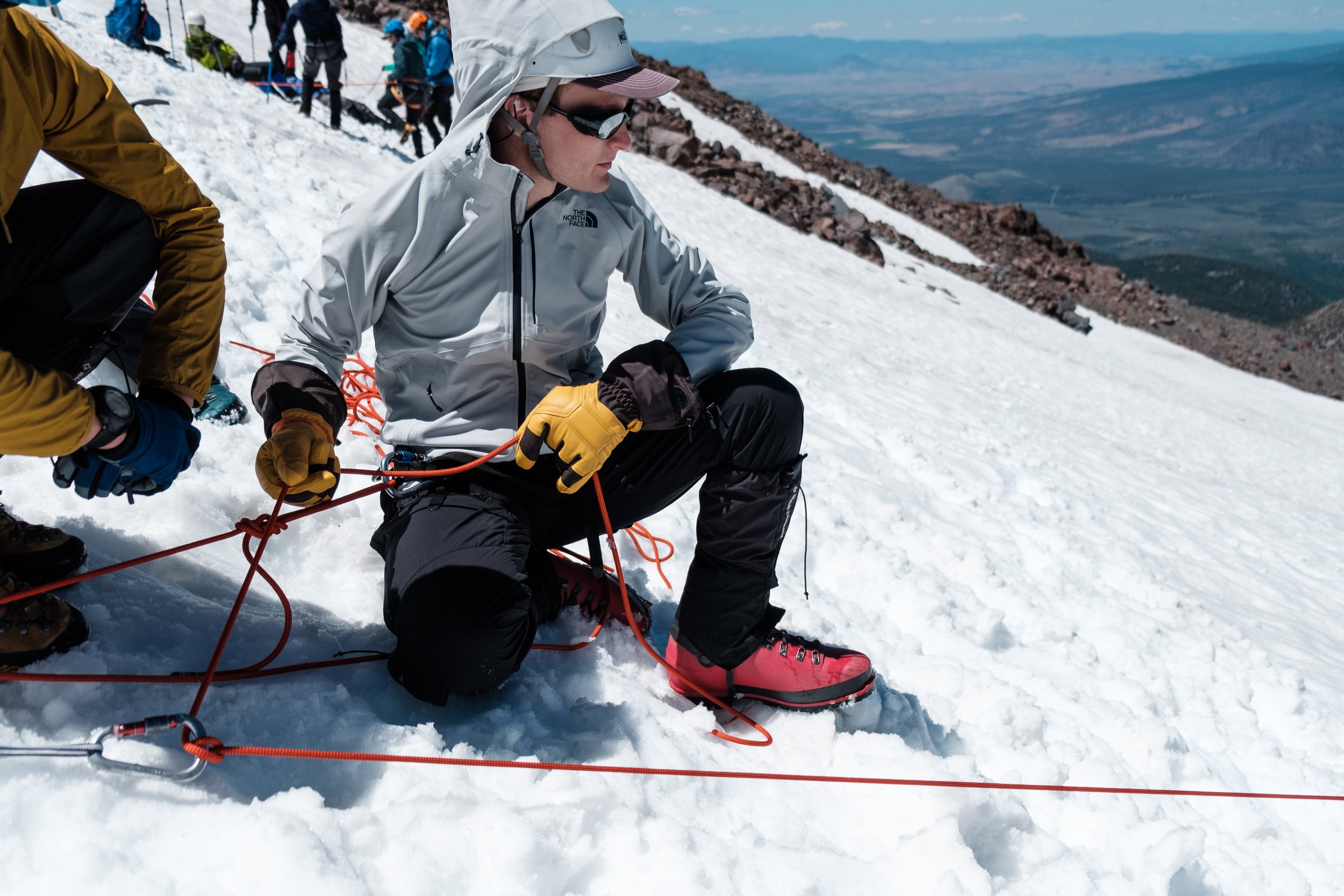 Course participant practices mountaineering technique