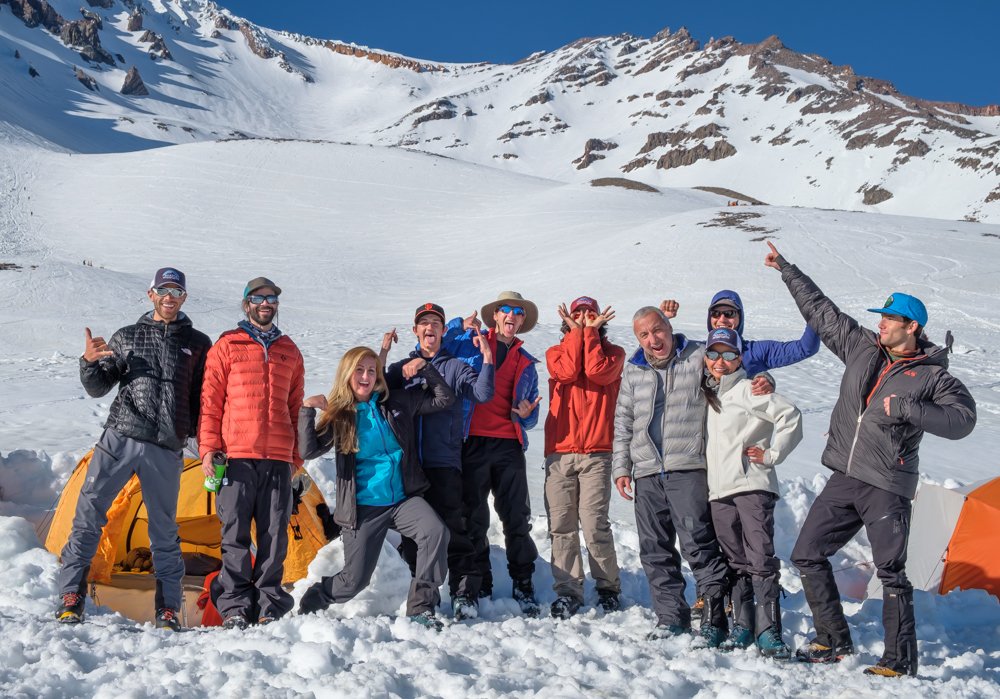 Climbers pose together at 50/50 base camp