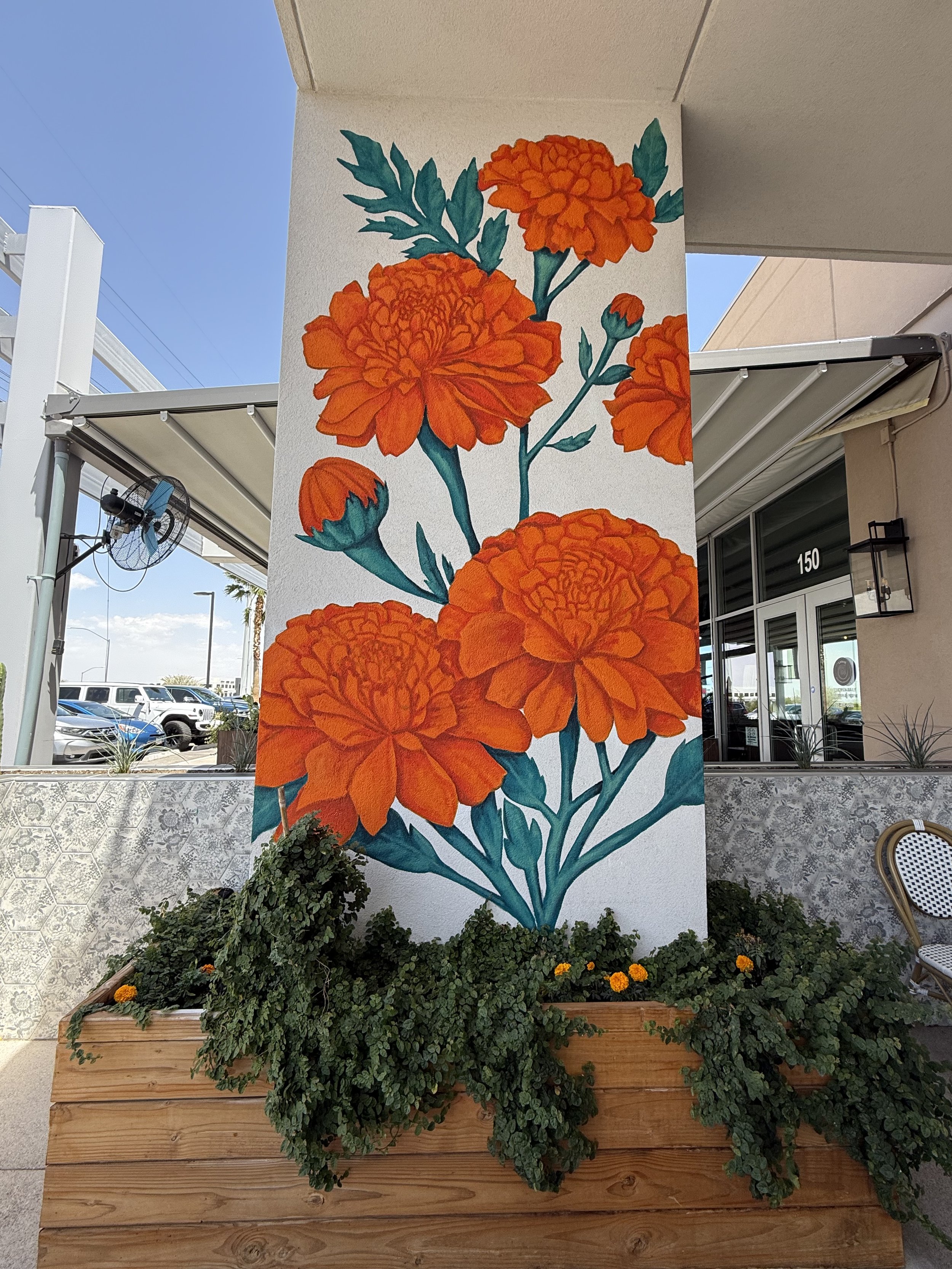 Marigold Mural. Location: Naan & Curry, an Indian Restaurant in Henderson, NV. 2025