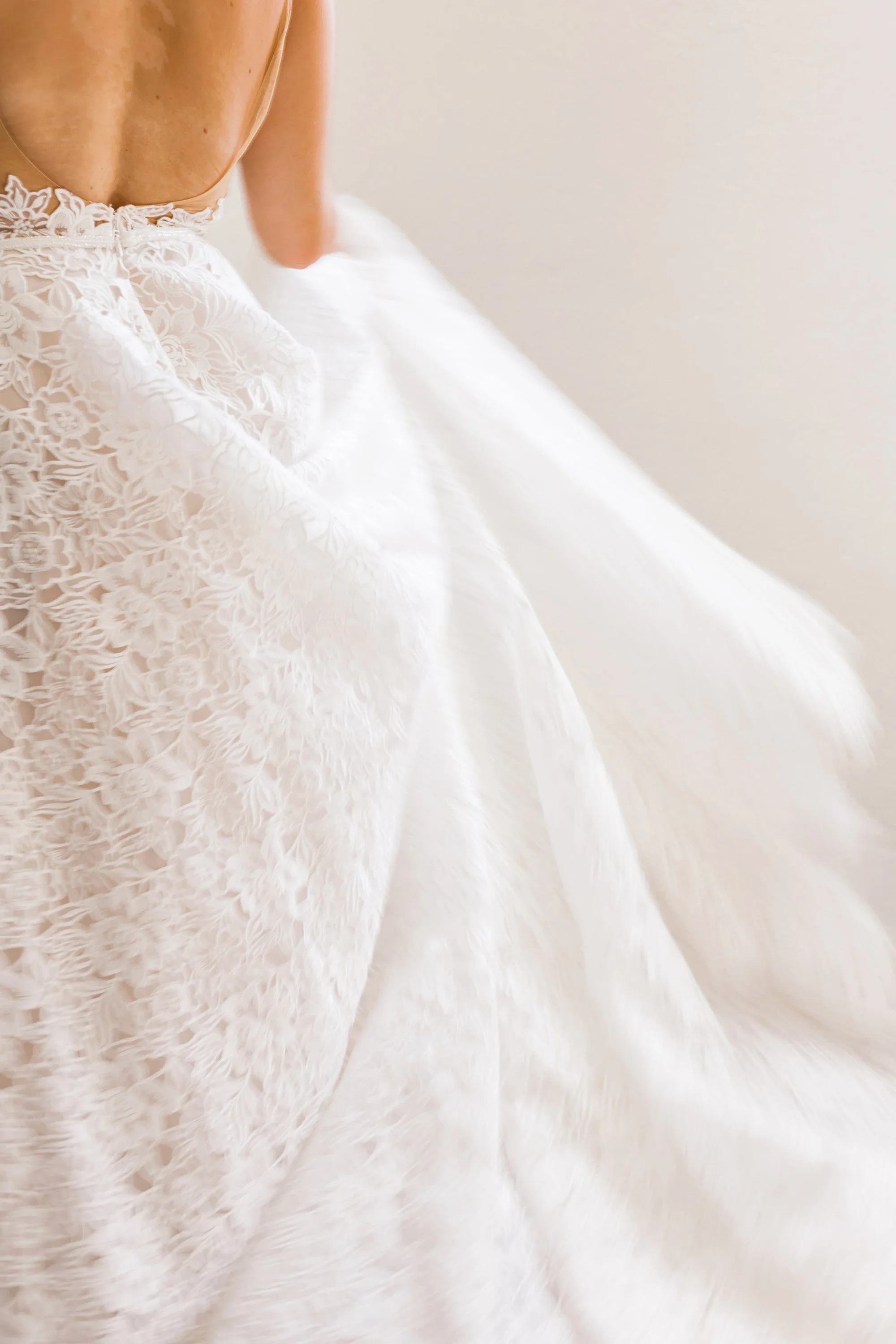 The Timeless Elegance of Bustles on a Wedding Gown: A Bridal Fashion Icon
