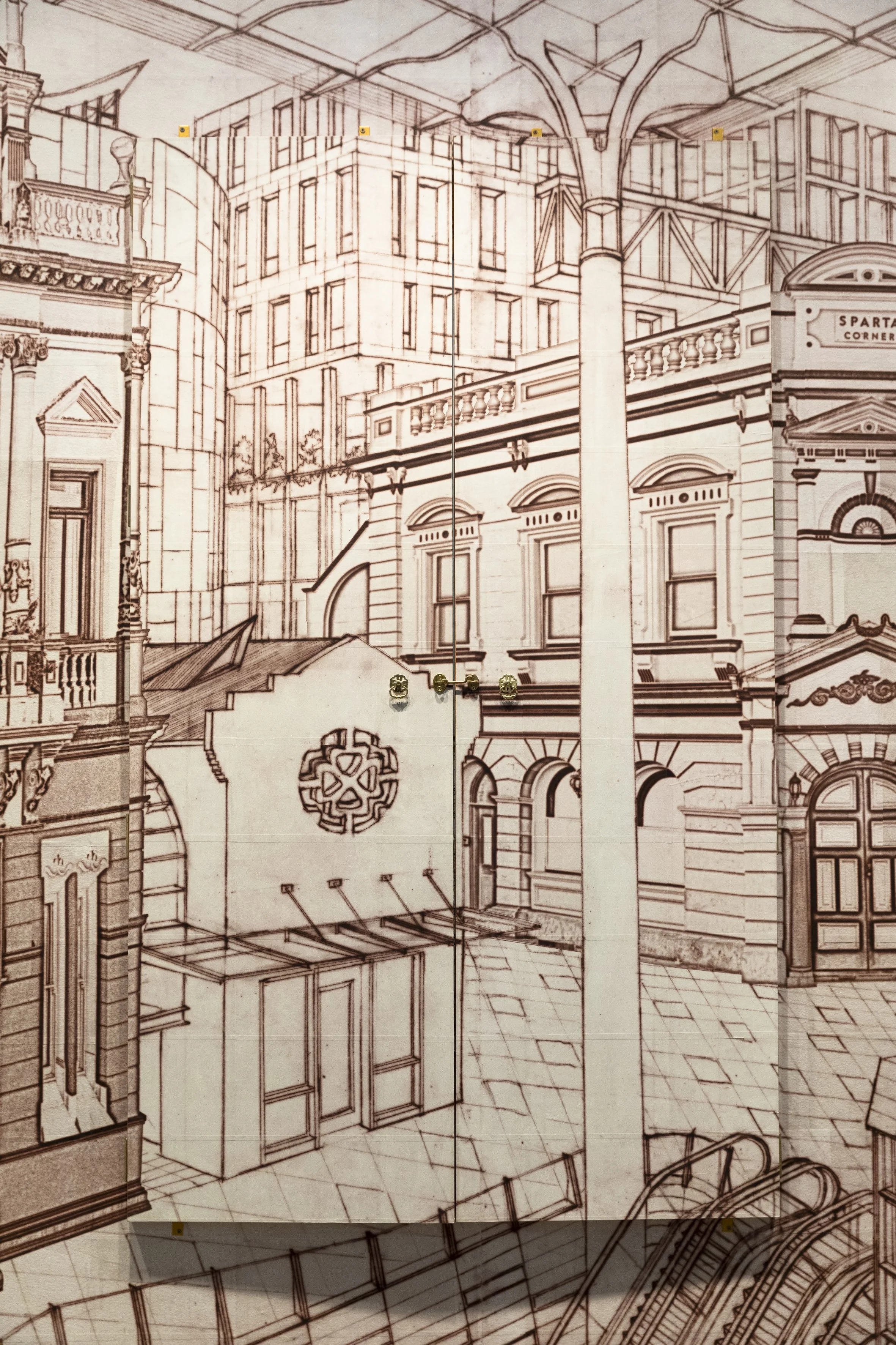 Detail of closed doors and cityscape. Photograph by Silversalt (Jennifer Leahy)