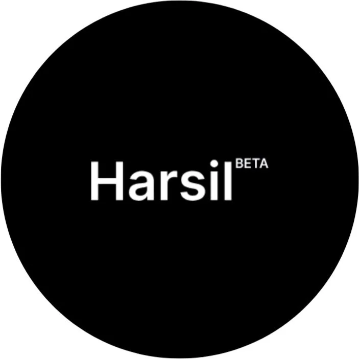 Black circular logo with the word 'Harsil' in bold white letters and 'BETA' in smaller white letters beside it.