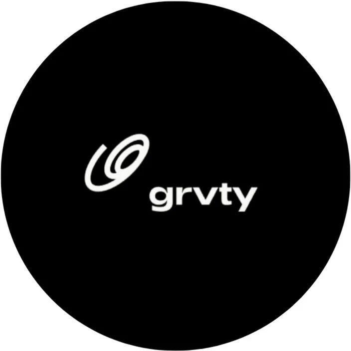 Black circular background with a white logo of a spiral and the word 'grvty' in lowercase letters.