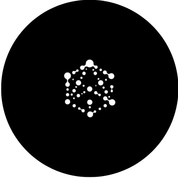 A white molecular structure or geometric pattern on a black circular background.