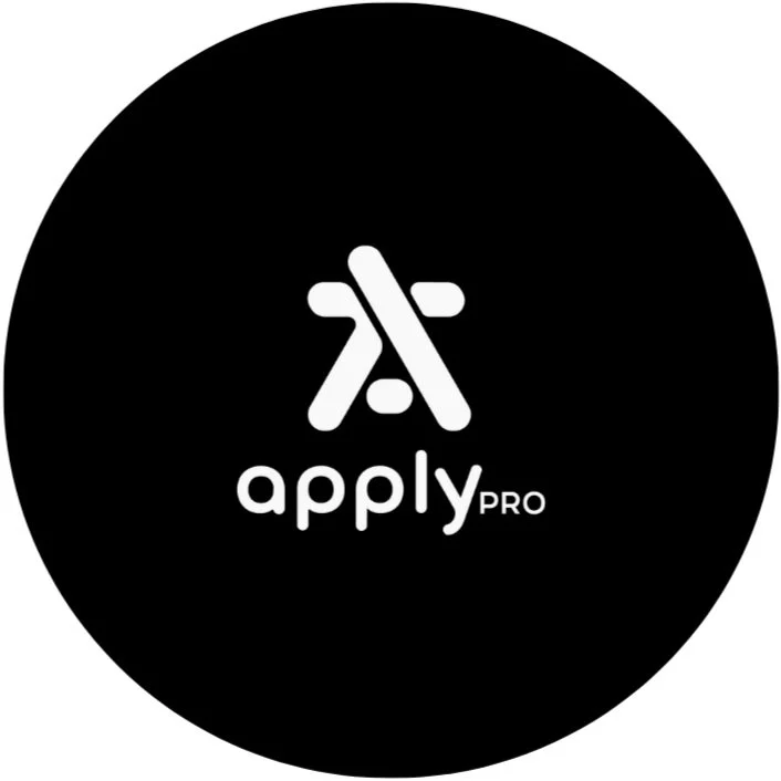 Black circular background with a white logo and text. The logo consists of two stylized, intersecting lines forming an abstract 'A' shape. Below the logo, the text reads 'apply PRO' with 'apply' in lowercase and 'PRO' in uppercase.