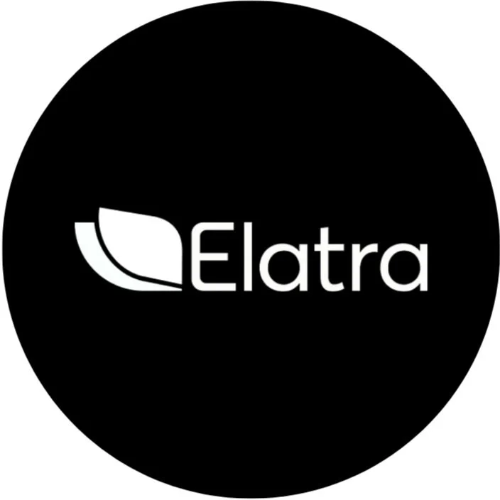 The logo of Elatra, featuring a stylized leaf symbol and the word 'Elatra' in white text on a black circular background.