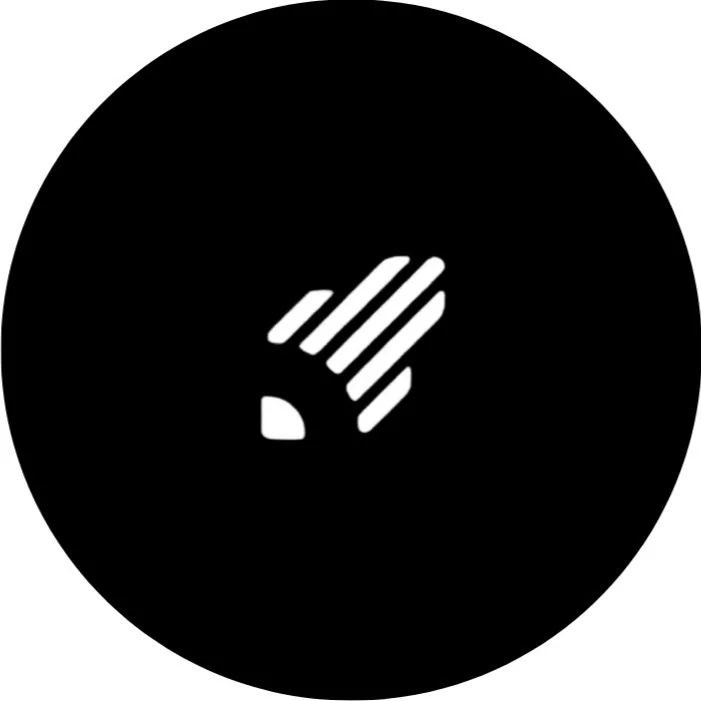 Icon of a hand with lines indicating motion, inside a black circle.