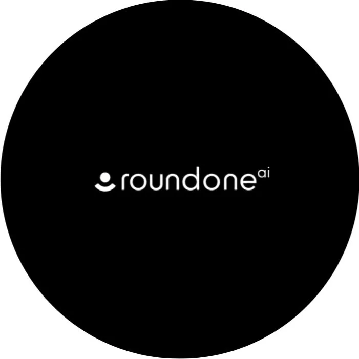 Black circular background with the white logo and text for 'roundone ai' in the center.