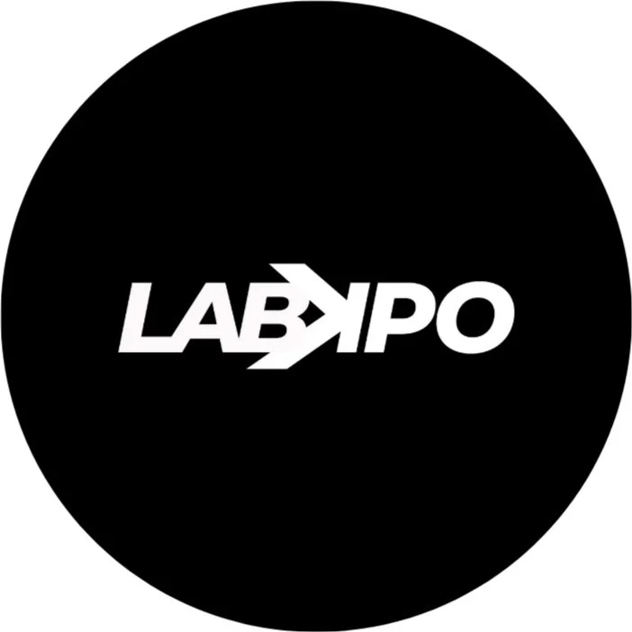 Labyrinth logo in white text on a black circular background