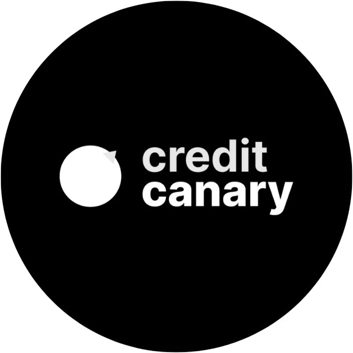 Black circular logo with a white circle resembling a credit card chip on the left and the words 'credit canary' in bold white letters on the right.