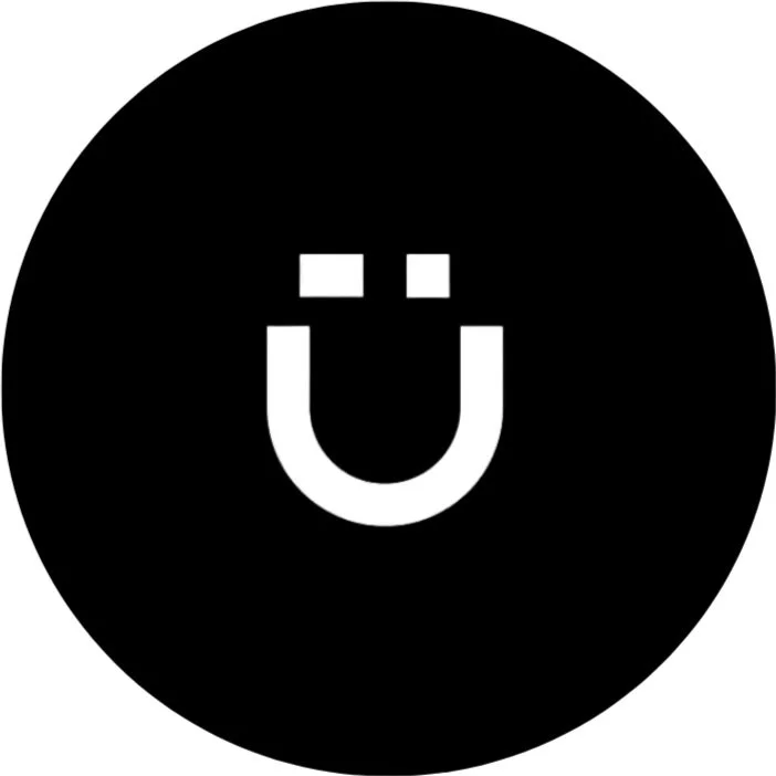 Black circular background with a white magnet icon in the center.