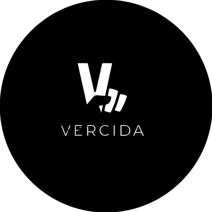 Black circular logo with a stylized white 'V' and six lines resembling a hand gesture, and the text 'VERCIDA' underneath.