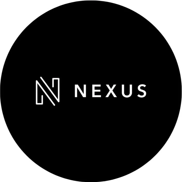 Black circle with white text and logo reading 'Nexus' and a stylized 'N' symbol.