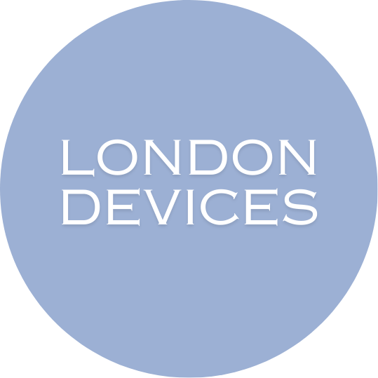 A circular logo with a light blue background and the words "LONDON DEVICES" in white, centered in the middle.