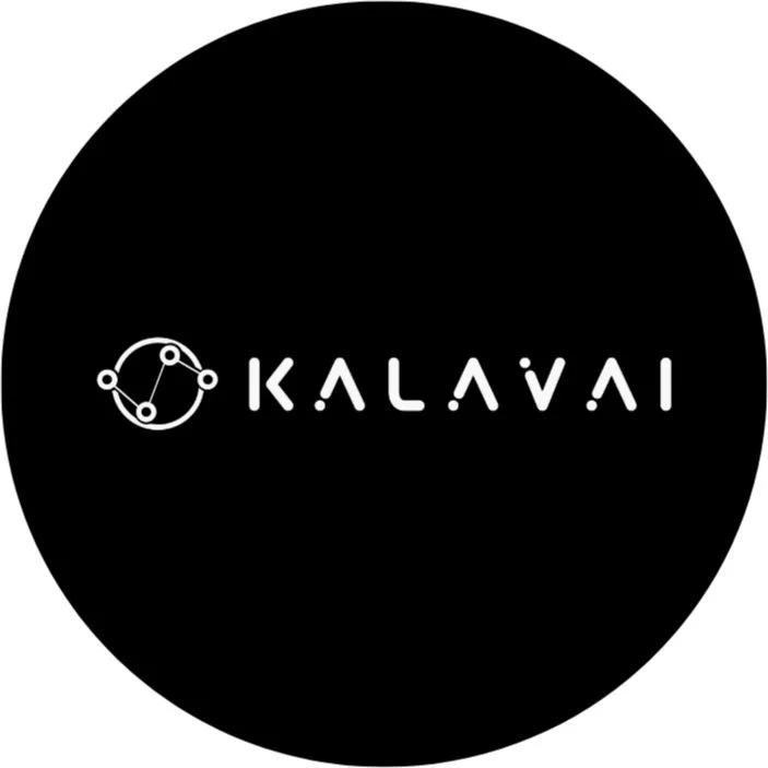 A black circular background with a white logo featuring an atomic or molecular design on the left and the text 'KALAVAI' in stylized white font on the right.