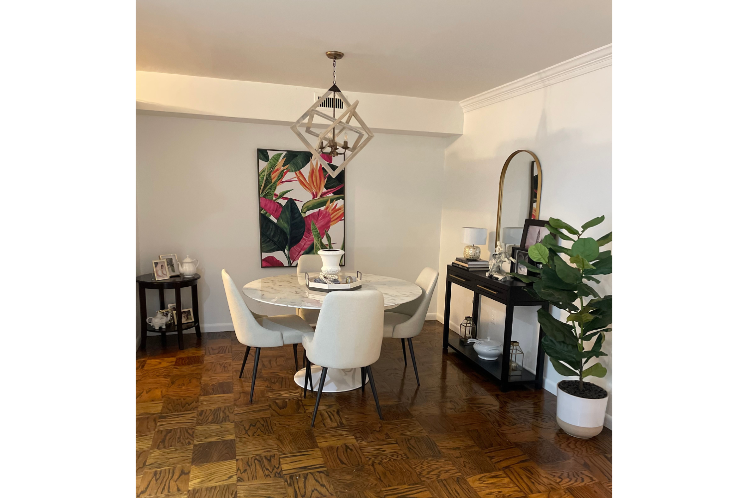 Coastal-inspired dining room interior by House of Shima featuring soft neutral furnishings, layered textures, greenery, and a relaxed summer aesthetic with timeless styling.
