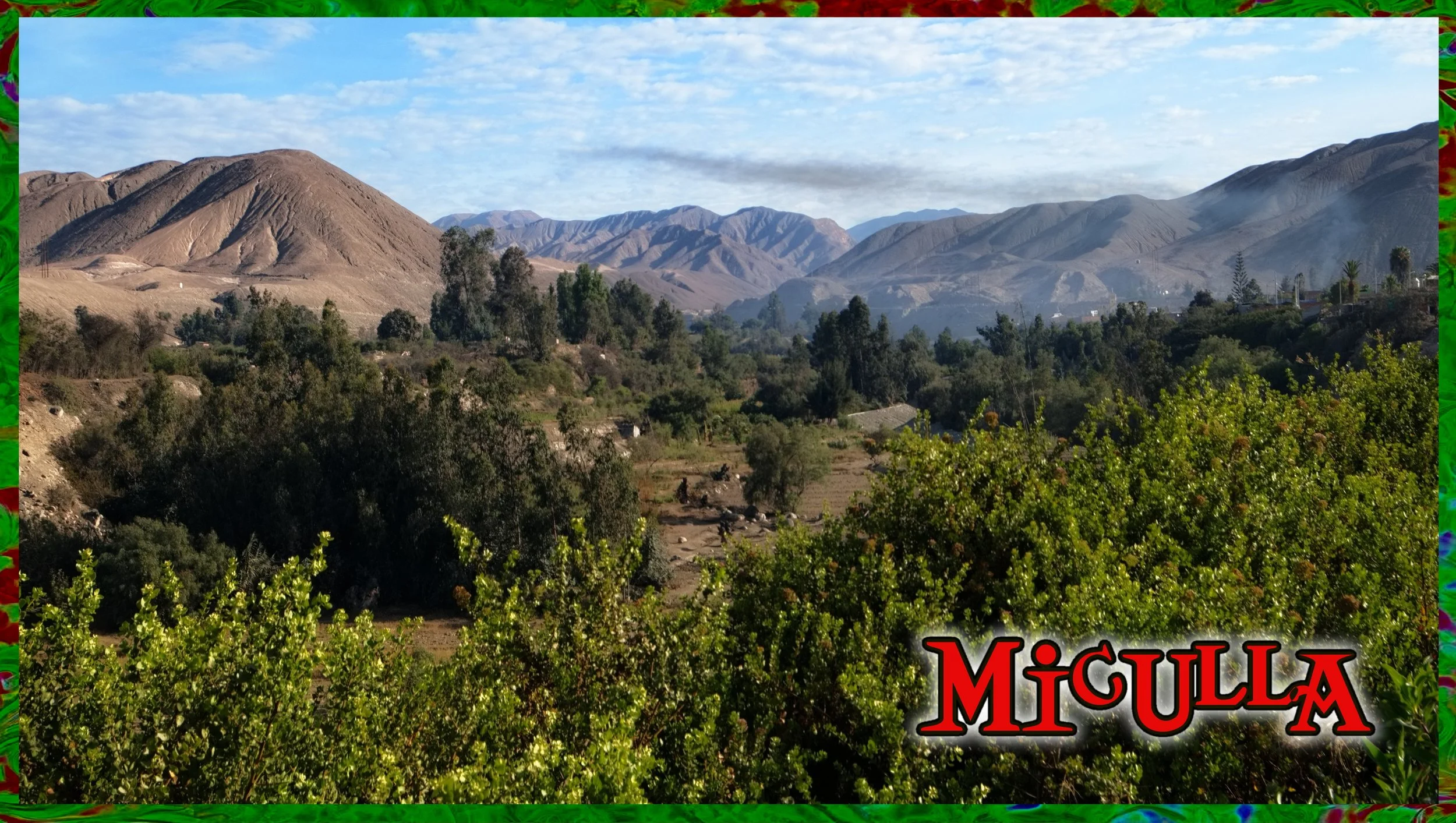 Scenic view of a mountainous landscape with green trees and shrubs in foreground, rolling hills and mountains in background, under a partly cloudy sky. The word 'MICULLA' is written at the bottom right corner in bold red letters with black outline.