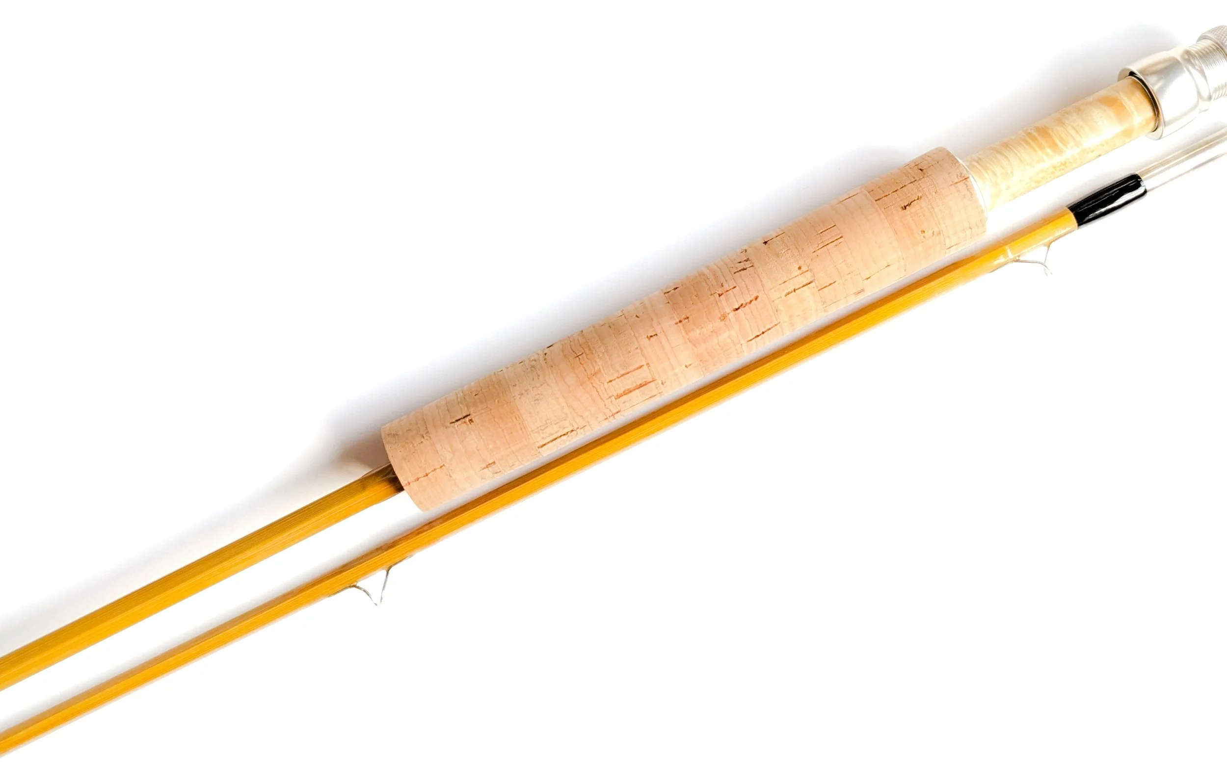 A fishing rod with a cork handle and a reel, set against a white background.
