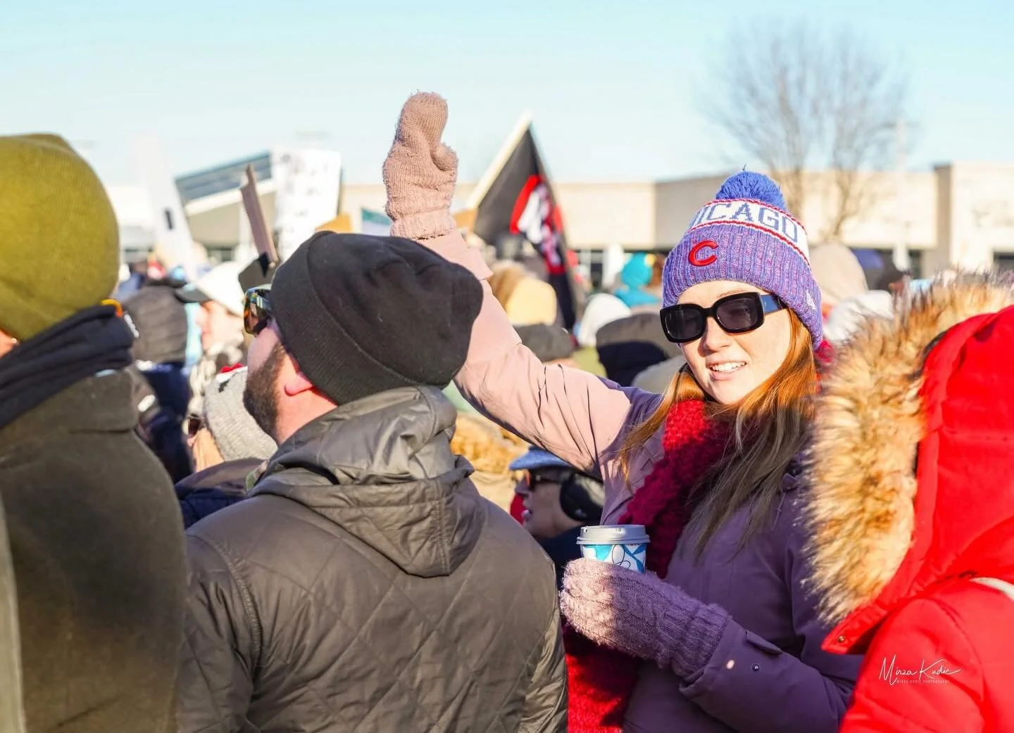 POV: flipping off the president with mittens on