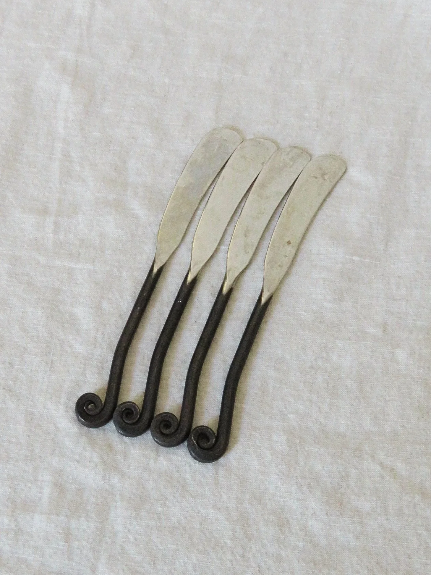 Set of 4 Vintage Silver and Iron Butter Knives