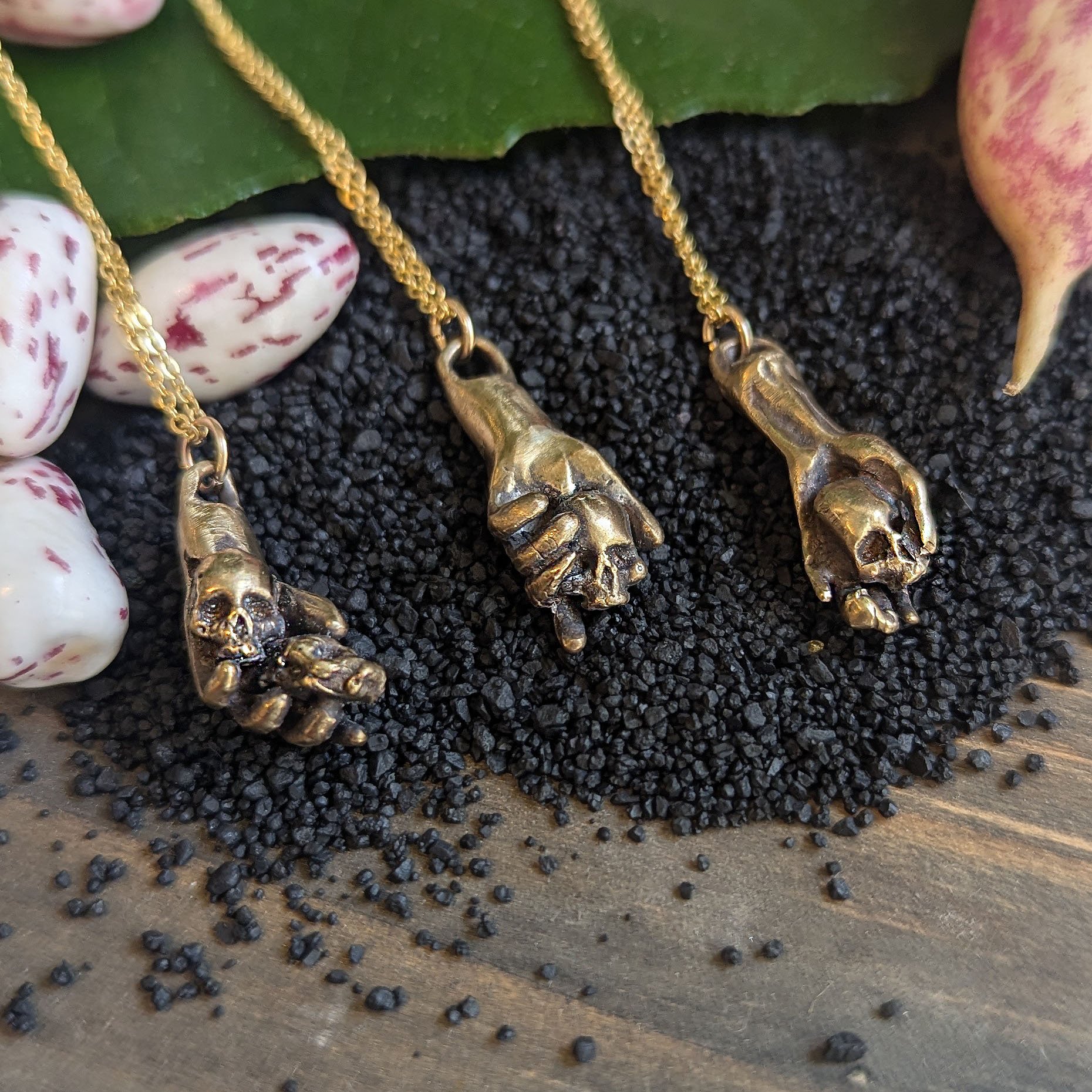 HandAndSkullsNecklacesOneofaKindAllStyles2.jpg