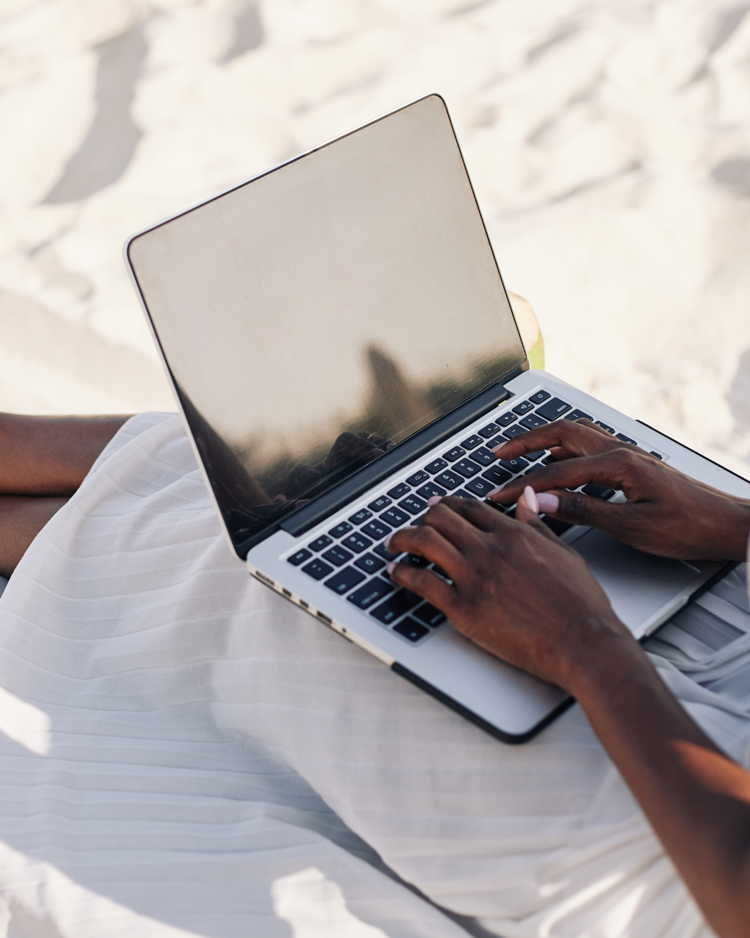 Woman entrepreneur planning digital marketing strategy for women-led wellness brand”