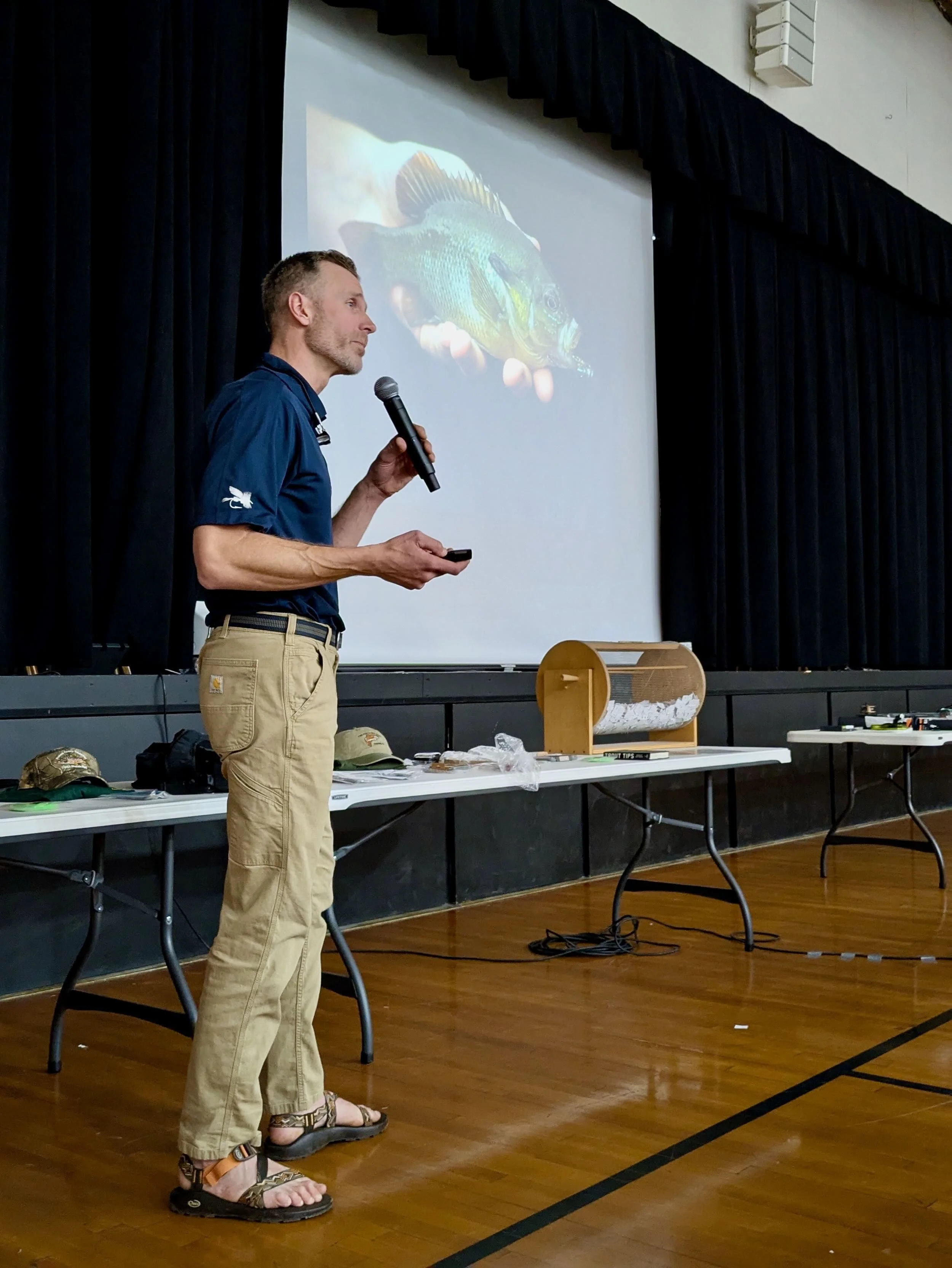 George Daniel discussing the stages of his personal fly fishing journey during this year's banquet