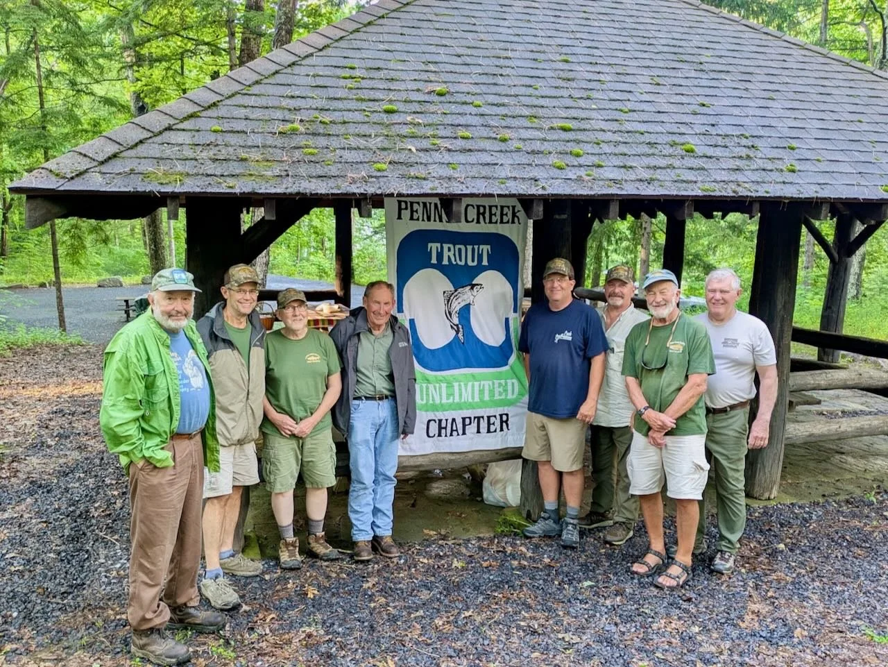Chapter members who attended the 2025 summer social standing in front of a Poe Paddy State pavilion
