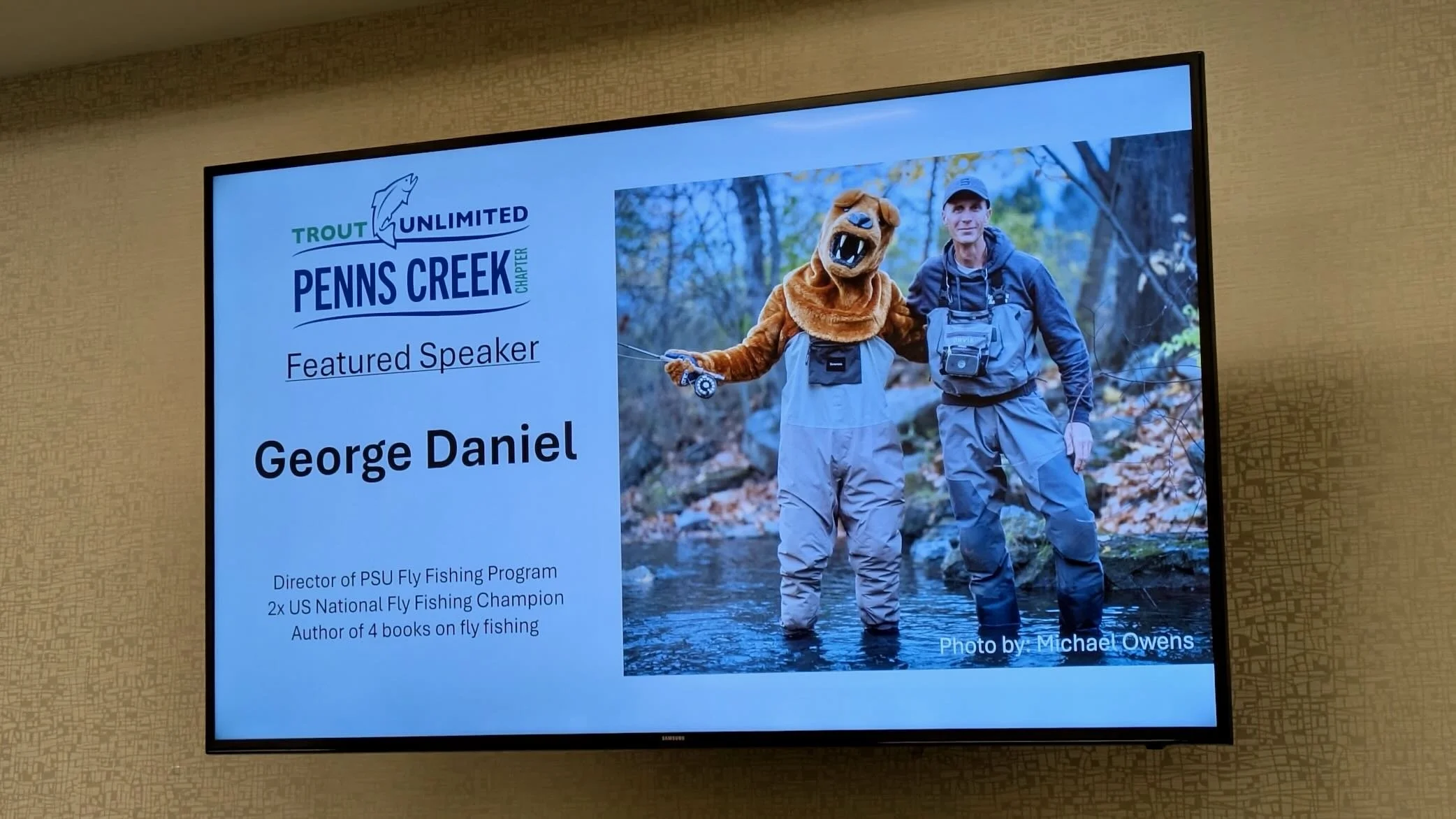 Presentation slide introducing George Daniel as the featured speaker at a Chapter's monthly meeting