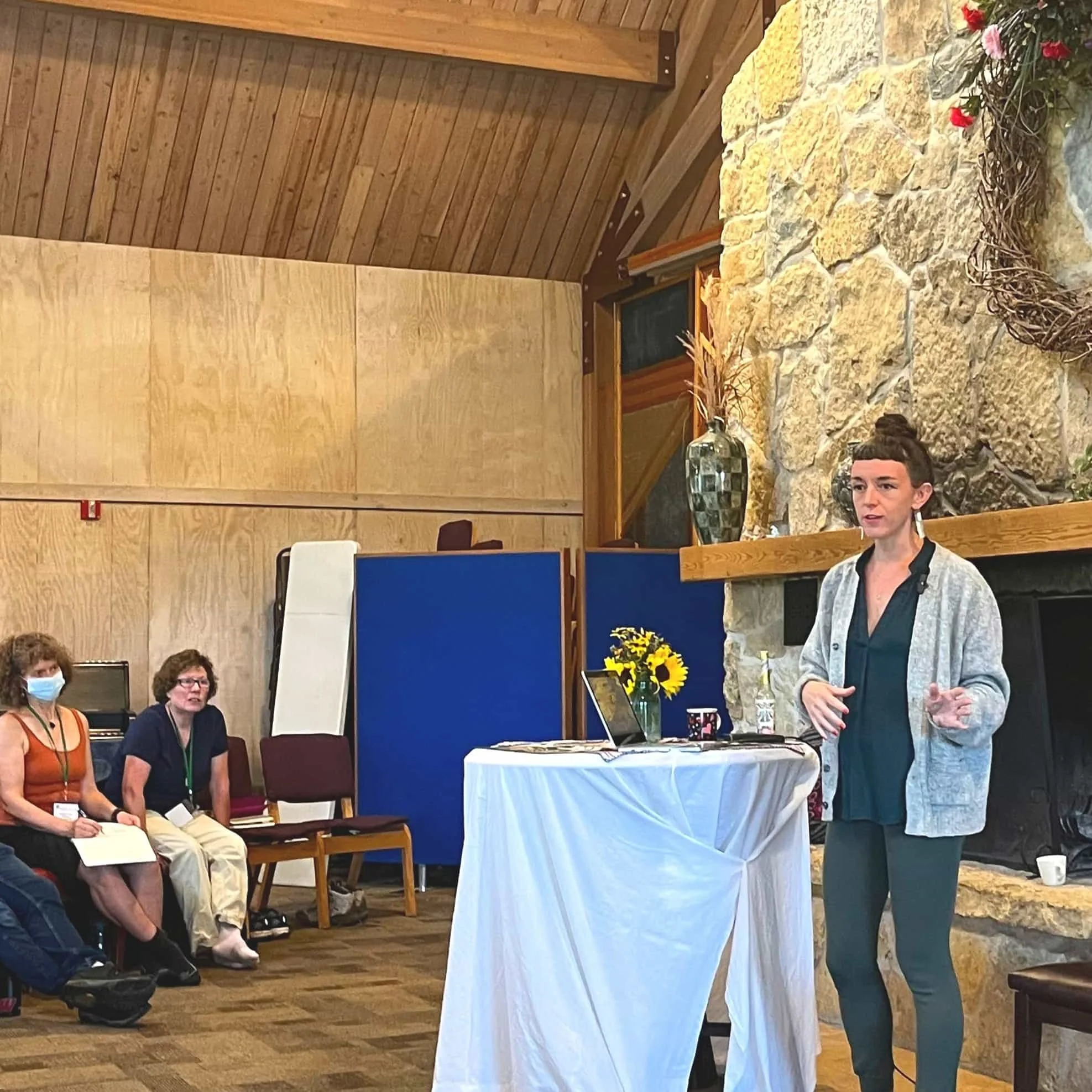 rev cindy standing at podium teaching garden of eden preaching teaching podcasts mystical christianity and psychic healing