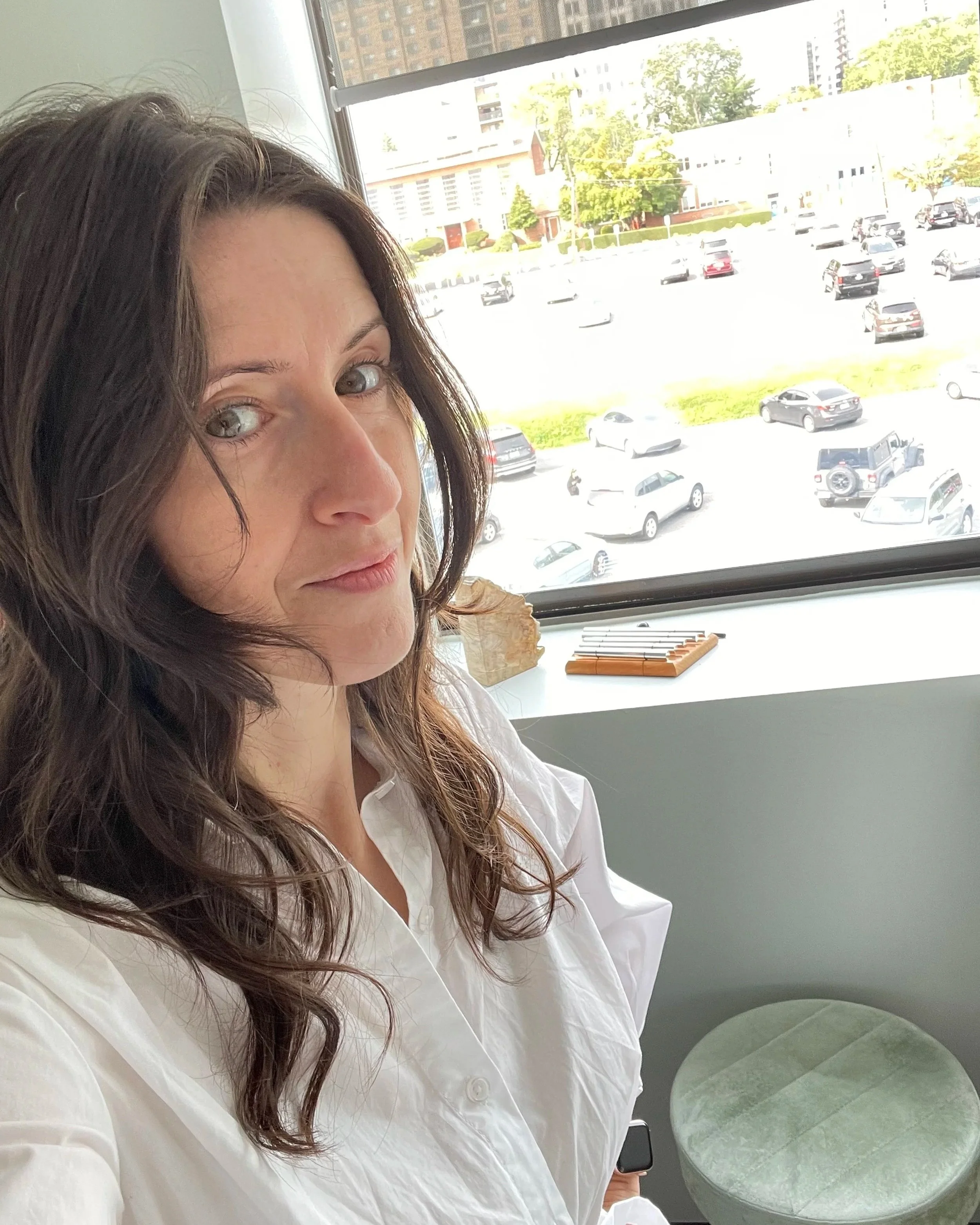 A self-taken picture of Rachel in her office