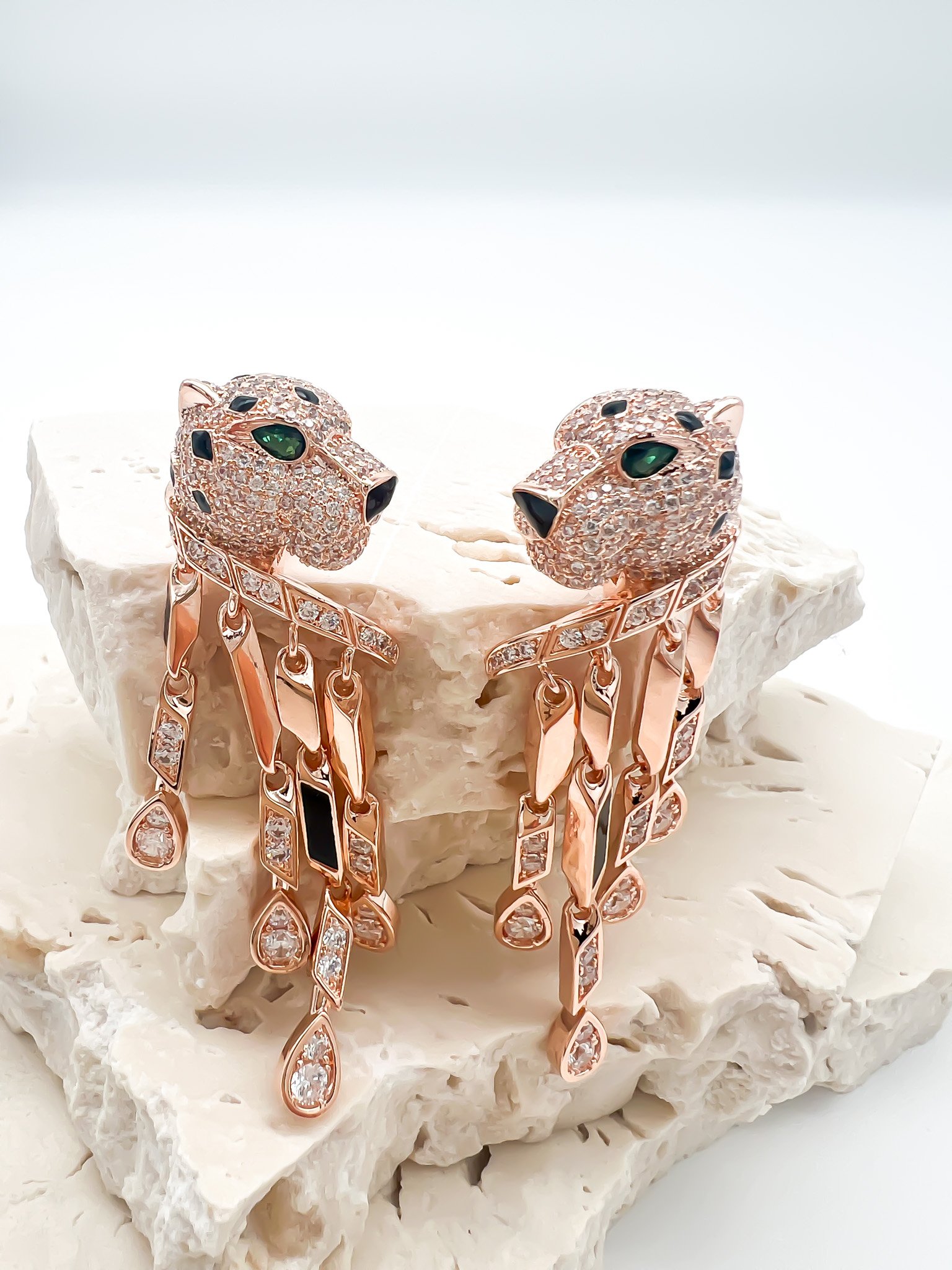 The Hazel Panther Drop Earrings. Moissanite stones set in sterling silver and plated in 18k rose gold vermeil.
