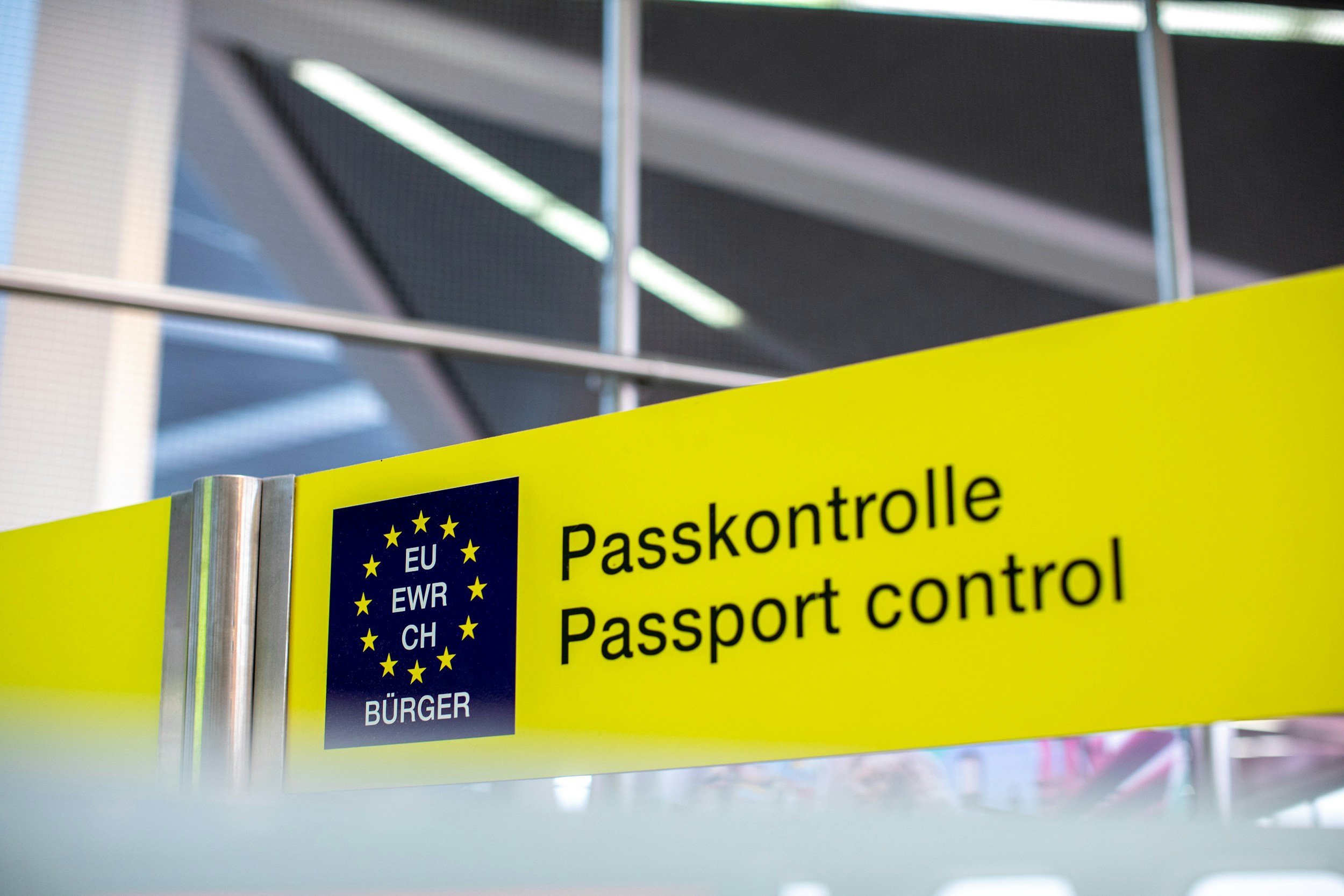 Passport control sign representing short-stay Schengen Visa C application preparation