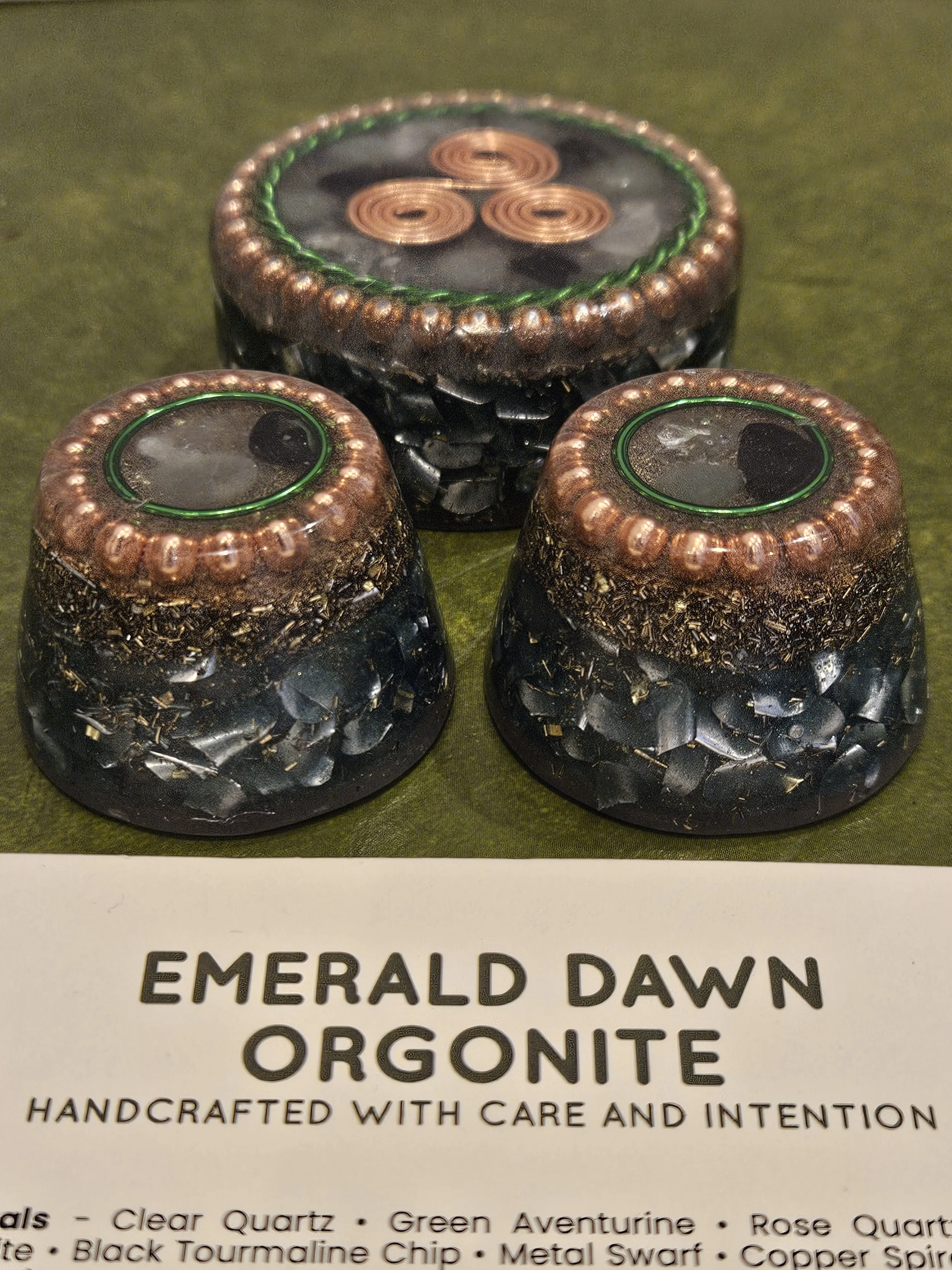 Emerald Dawn -  Table / Pocket  Orgonite
Table Orgonite Price £35
Pocket Orgonite Price £25 
Element: Earth

Made from: Clear Quartz, Green Aventurine, Rose Quartz, Hematite, Selenite, Black Tourmaline Chips, Metal Swarf, Copper Spiral, and Emerald G