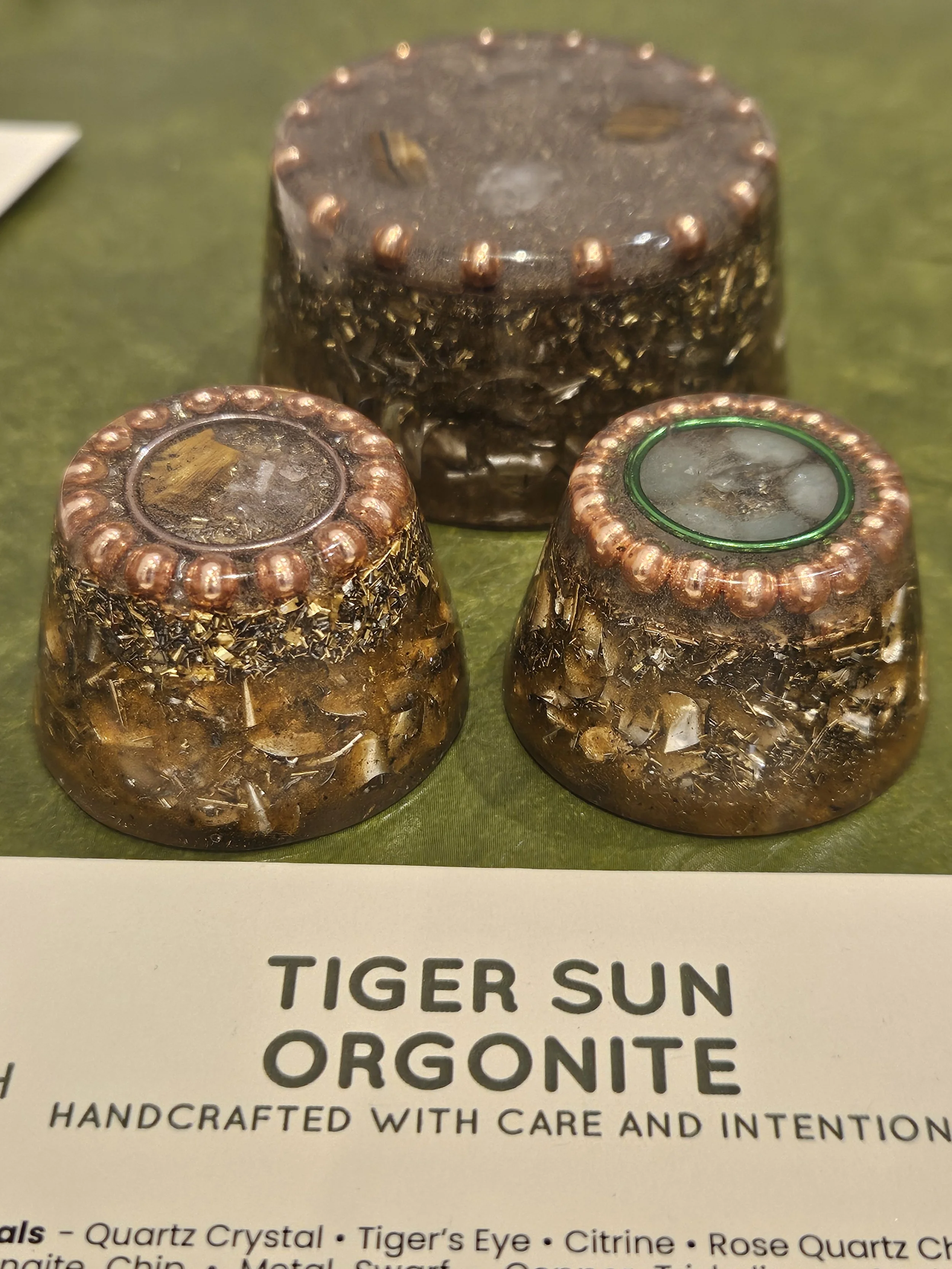 Tiger Sun  - Table / pocket Orgonite
Table Orgonite Price: £35
Pocket Orgonite price £25
Element: Fire

Made from: Quartz Crystal, Tiger’s Eye, Citrine, Rose Quartz Chips, Hematite, Shungite Chips, Metal Swarf, Copper Triskelion, and Sunburst Orange 