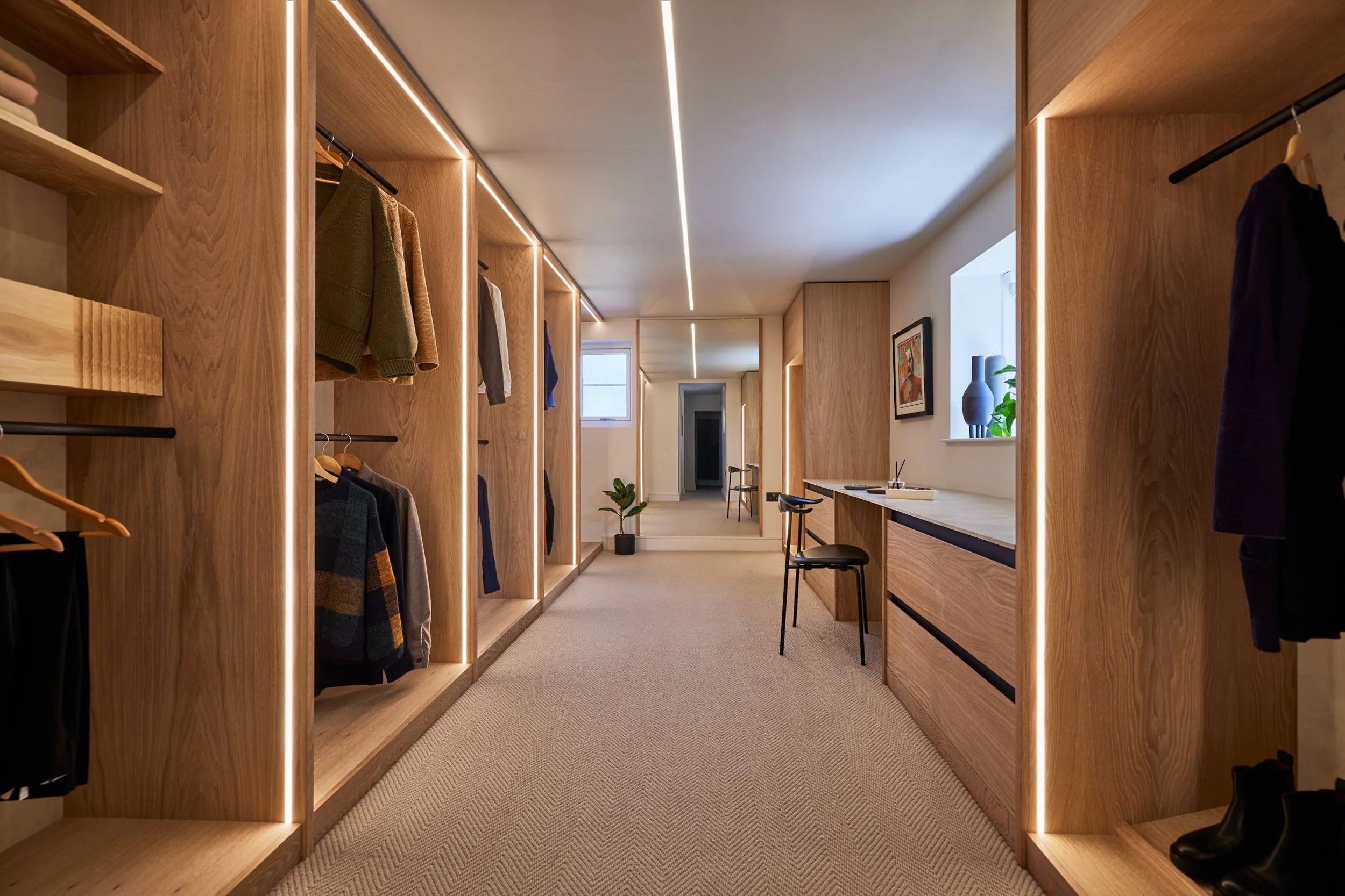 Bespoke dressing room joinery with integrated lighting – Boyes Design