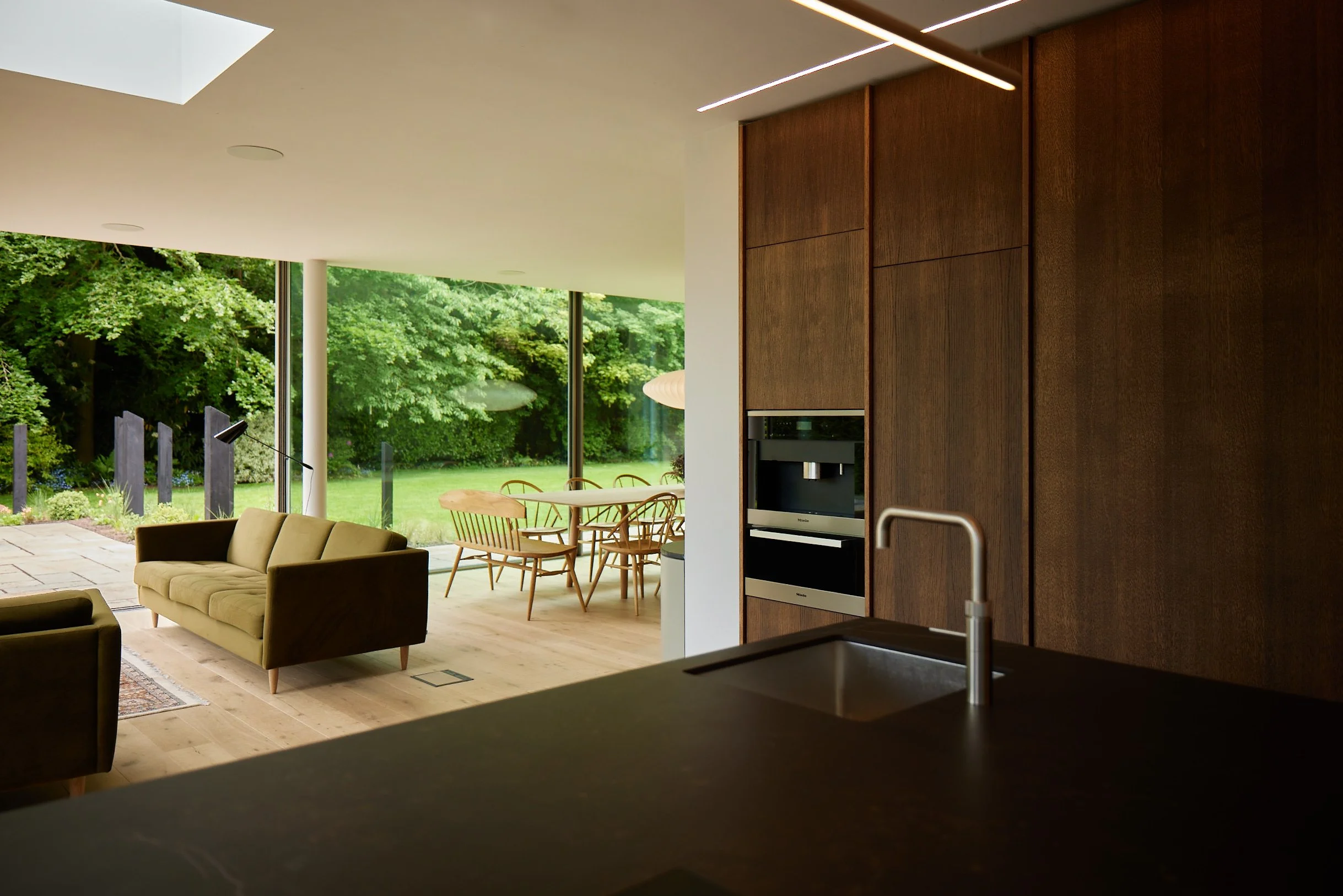 open plan kitchen dining space with timber joinery