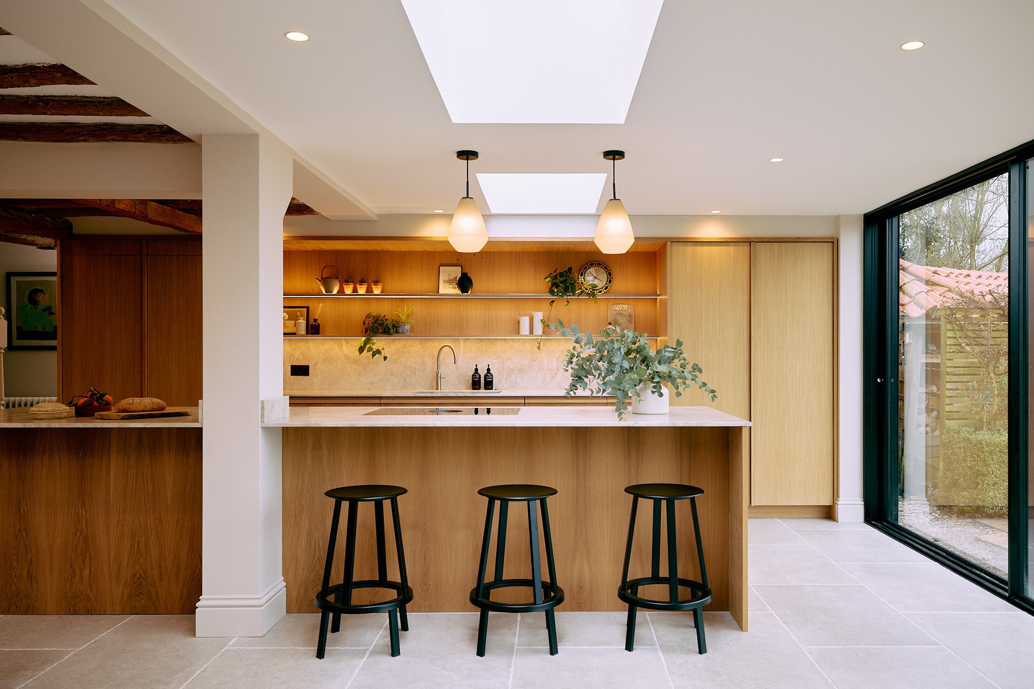 Bespoke oak kitchen within extension designed to connect seamlessly to the wider home in Farnsfield