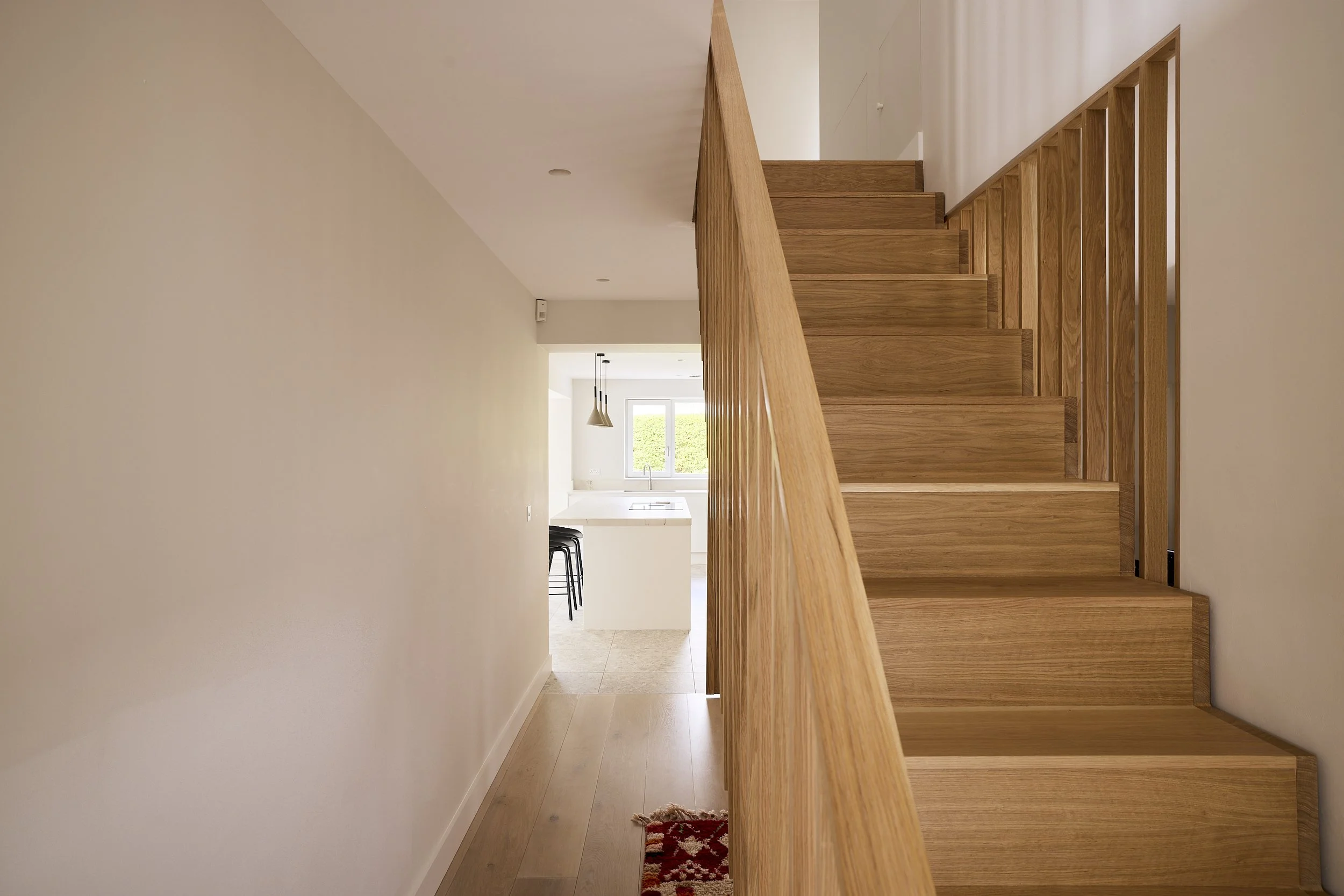 Bespoke oak staircase and interior joinery designed to improve layout and flow in Nottinghamshire home