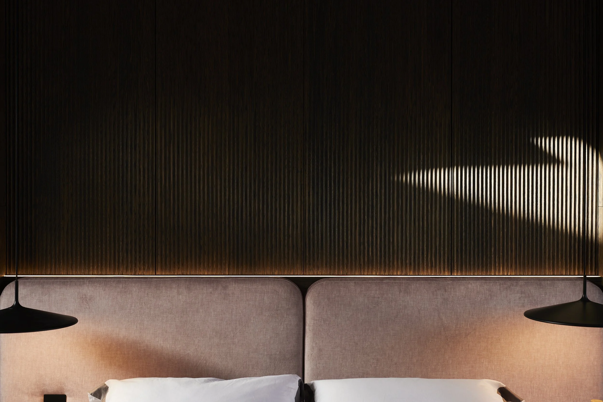 Bespoke bedroom joinery detail with integrated handles and clean lines in Nottinghamshire interior design project