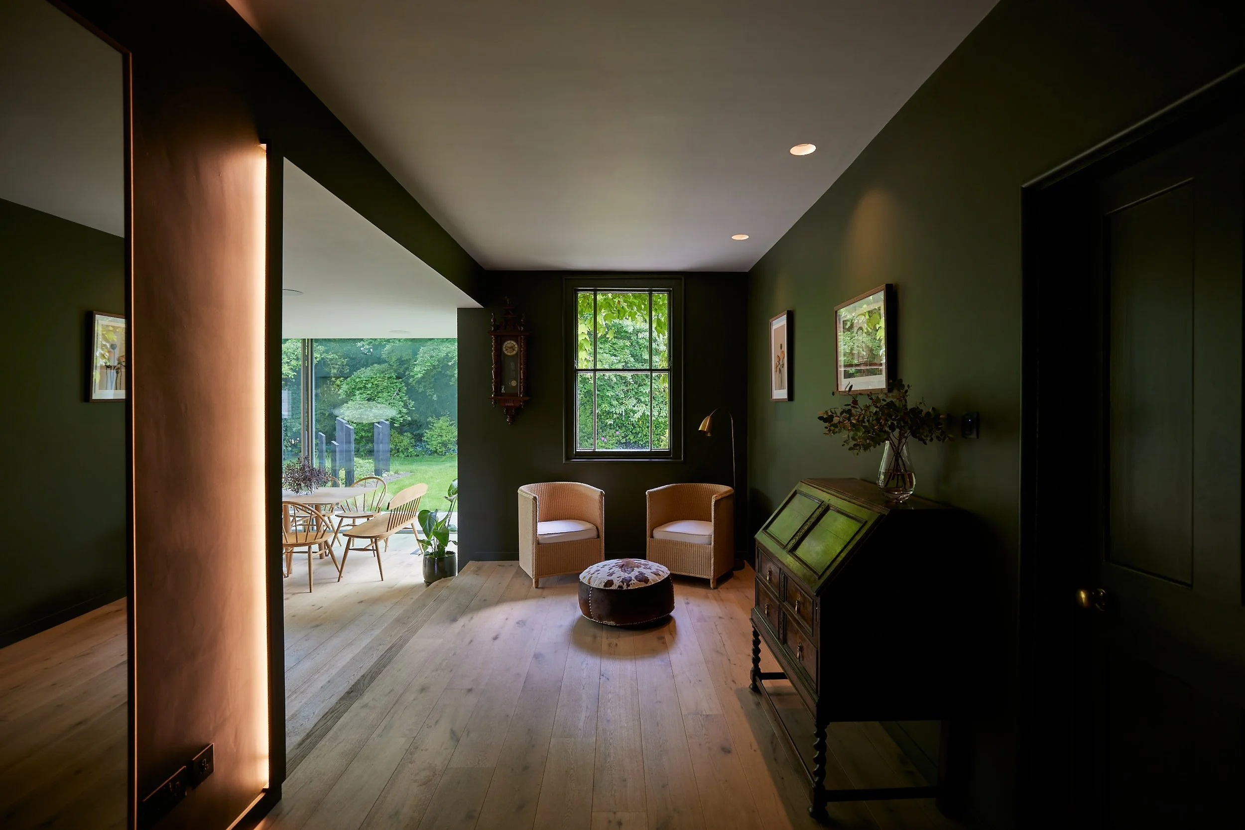 Calm, considered interior with layered lighting design