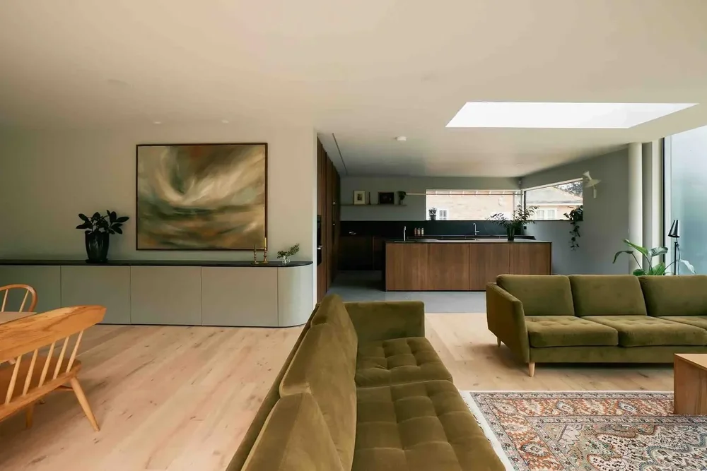 Kitchen, dining and living spaces at Wynstay House, with oak cabinetry and bespoke joinery