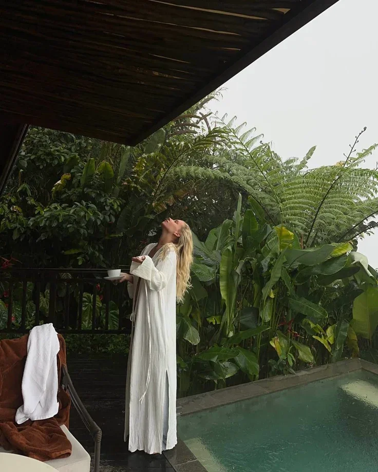 Woman leader reflecting in a quiet natural environment during a moment of personal recalibration