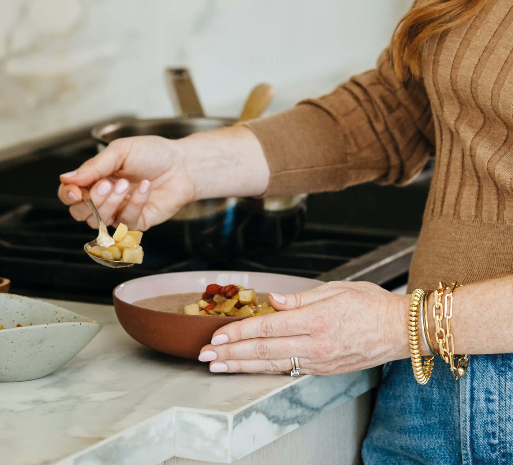 Lindsay Taylor tries one of her breakfast bowls from The Nourished Mother, her cookbook that includes recipes for postpartum healing.